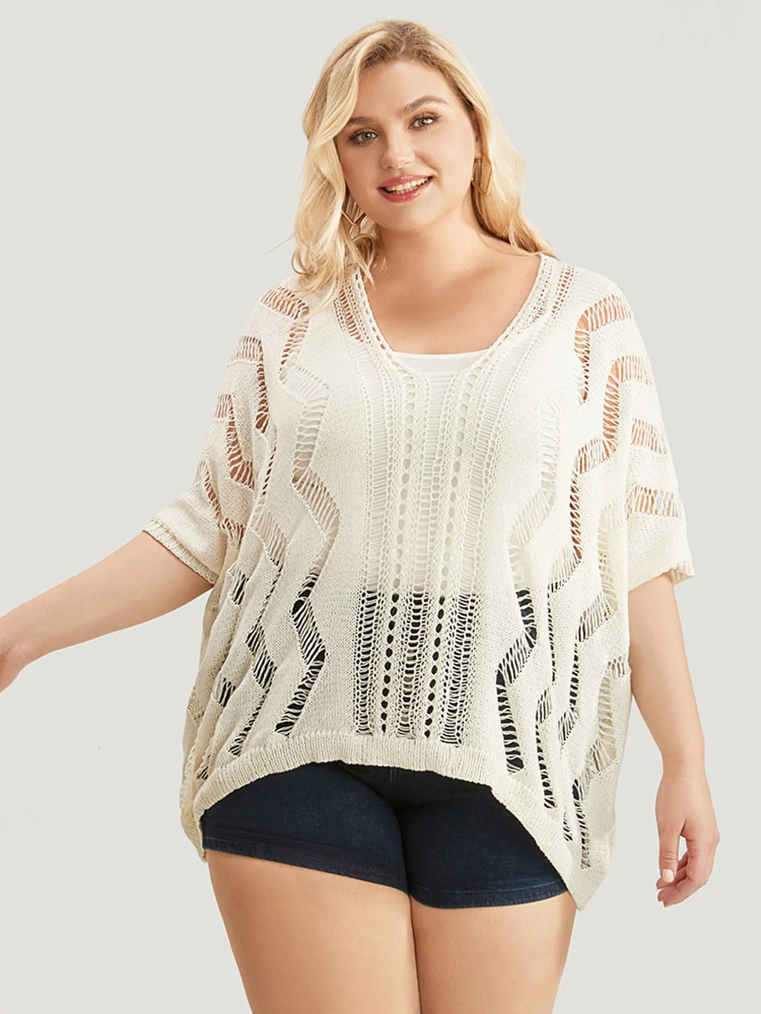 Ripple Print Hollow Out V Neck Eyelet Knit Top sold by Bloomchic