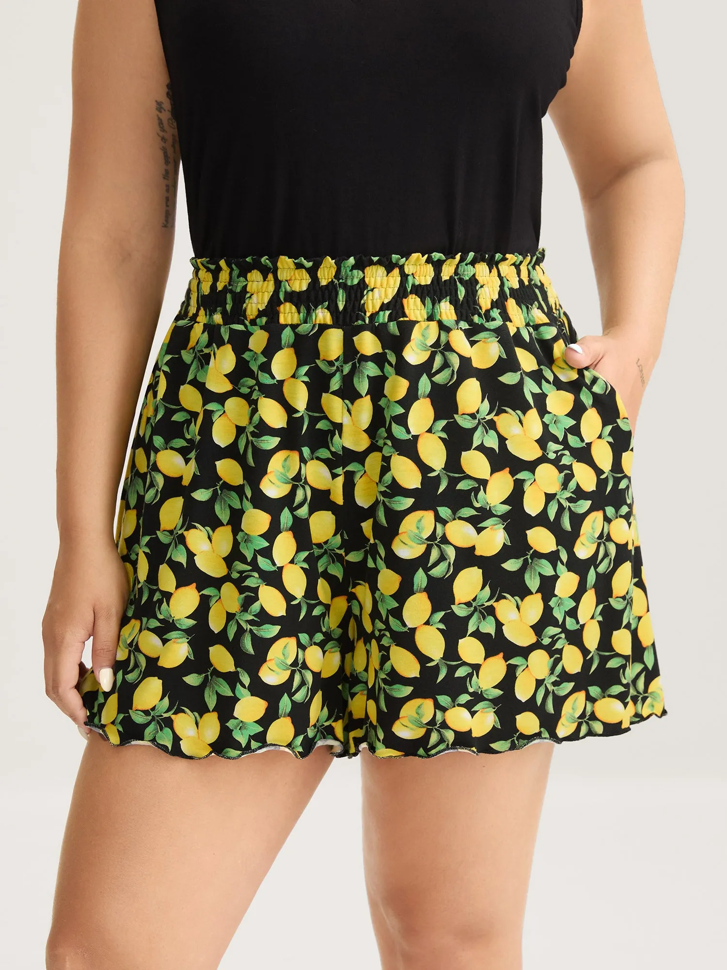 Lemon Print Wavy Hem Shirred Shorts sold by Bloomchic