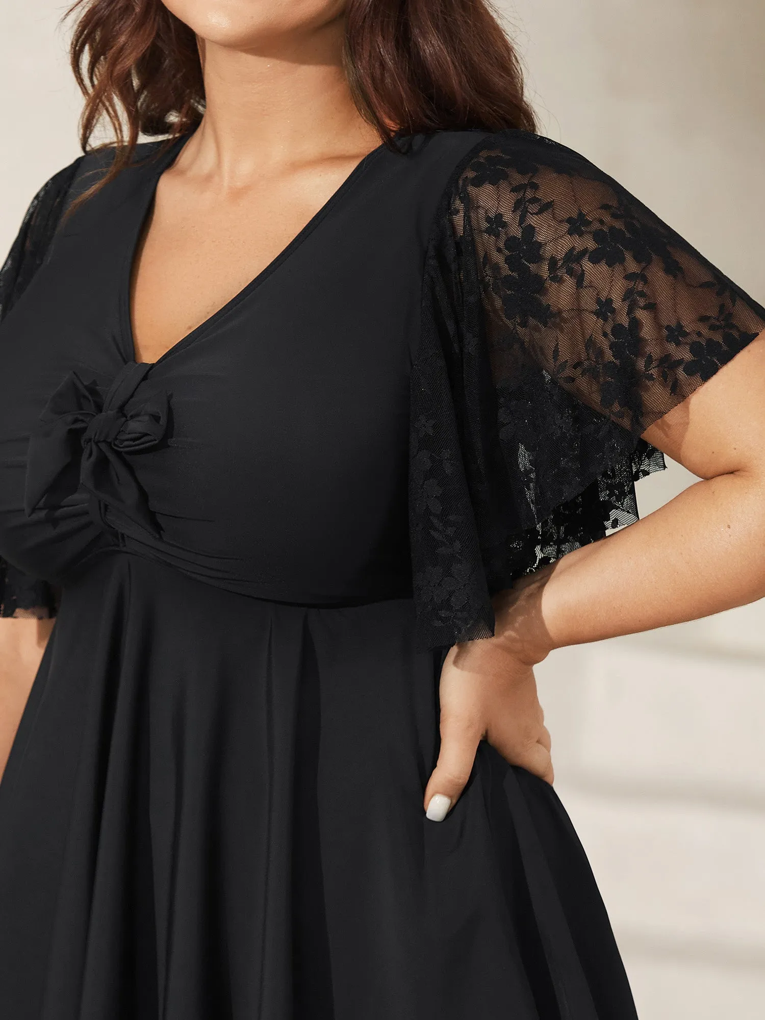 Knotted Lace Sheer Sleeve Swim Top sold by Bloomchic product image thumbnail 2