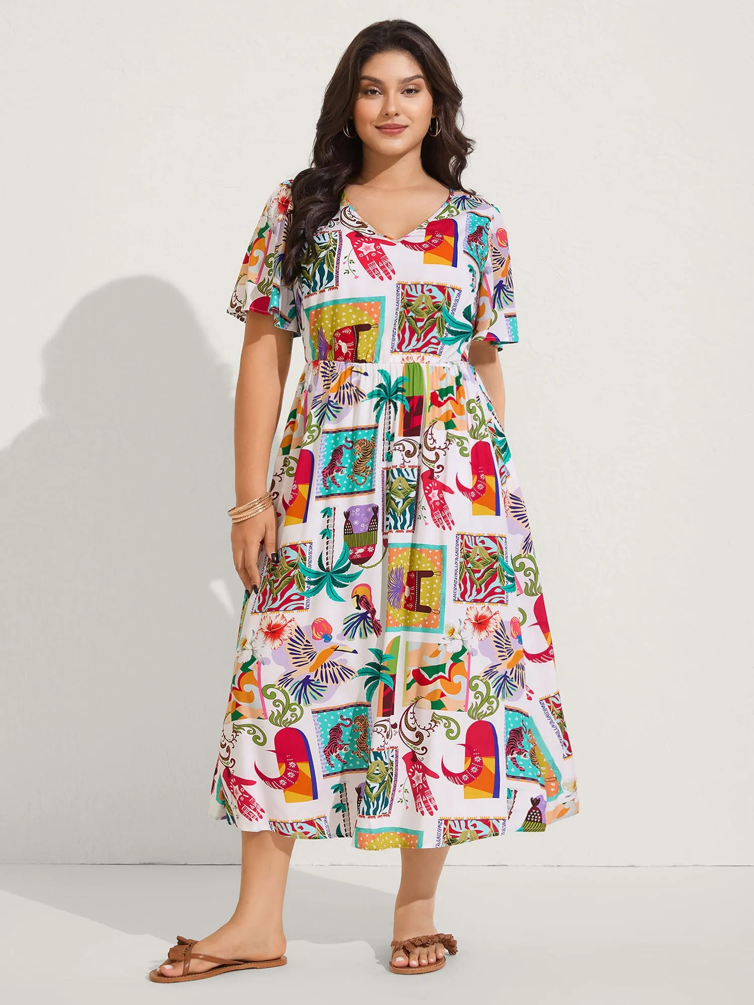 Tropical Collage Print Pockets Midi Dress sold by Bloomchic