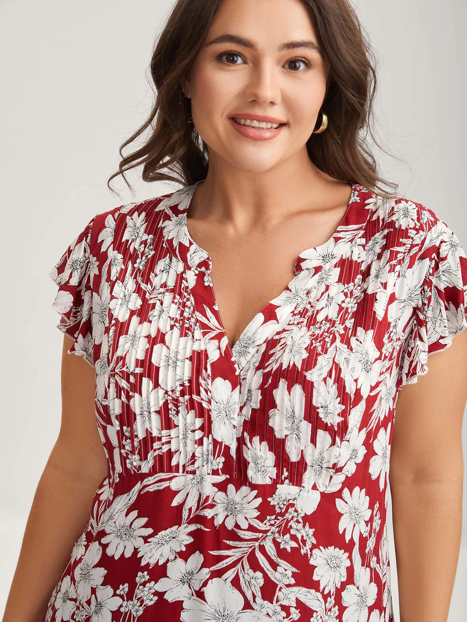 Silhouette Floral Toothpick Pleat Blouse sold by Bloomchic