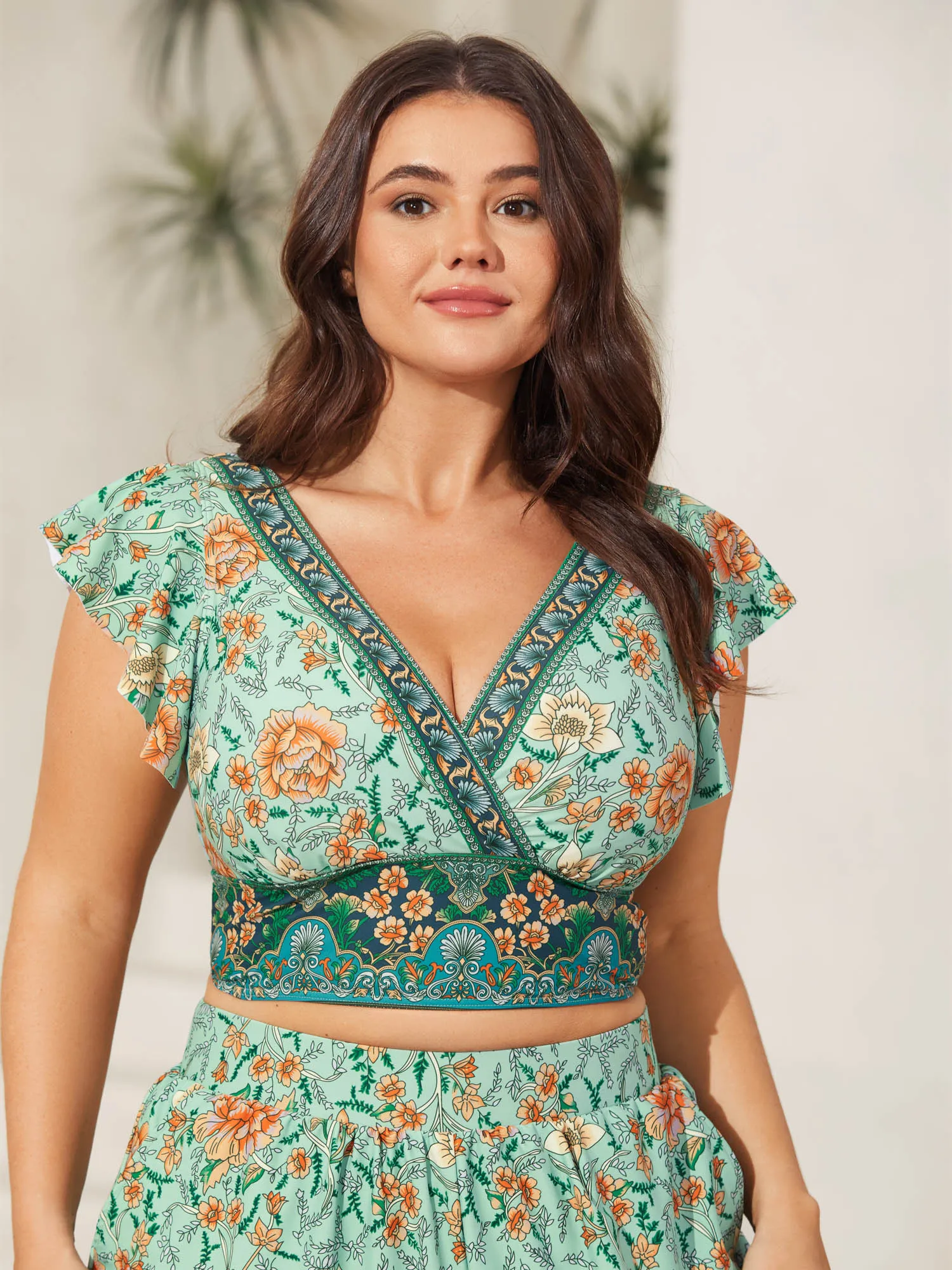 Breezy Floral Print Ruffled Swim Top sold by Bloomchic