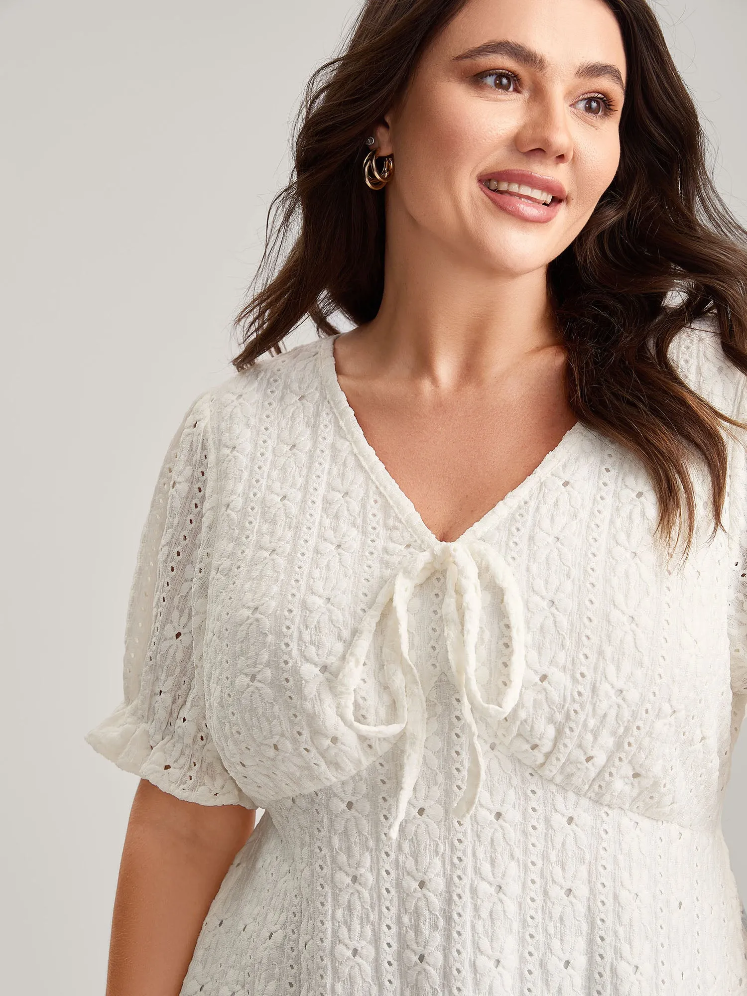 Textured Eyelet Embroidered Solid Blouse sold by Bloomchic