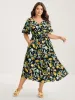Citrus Print Overlap Neck Shirred Midi Dress sold by Bloomchic