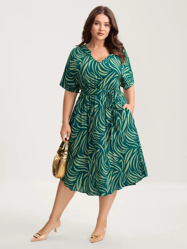 Grassy Print Curvy Hem Pockets Midi Dress sold by Bloomchic