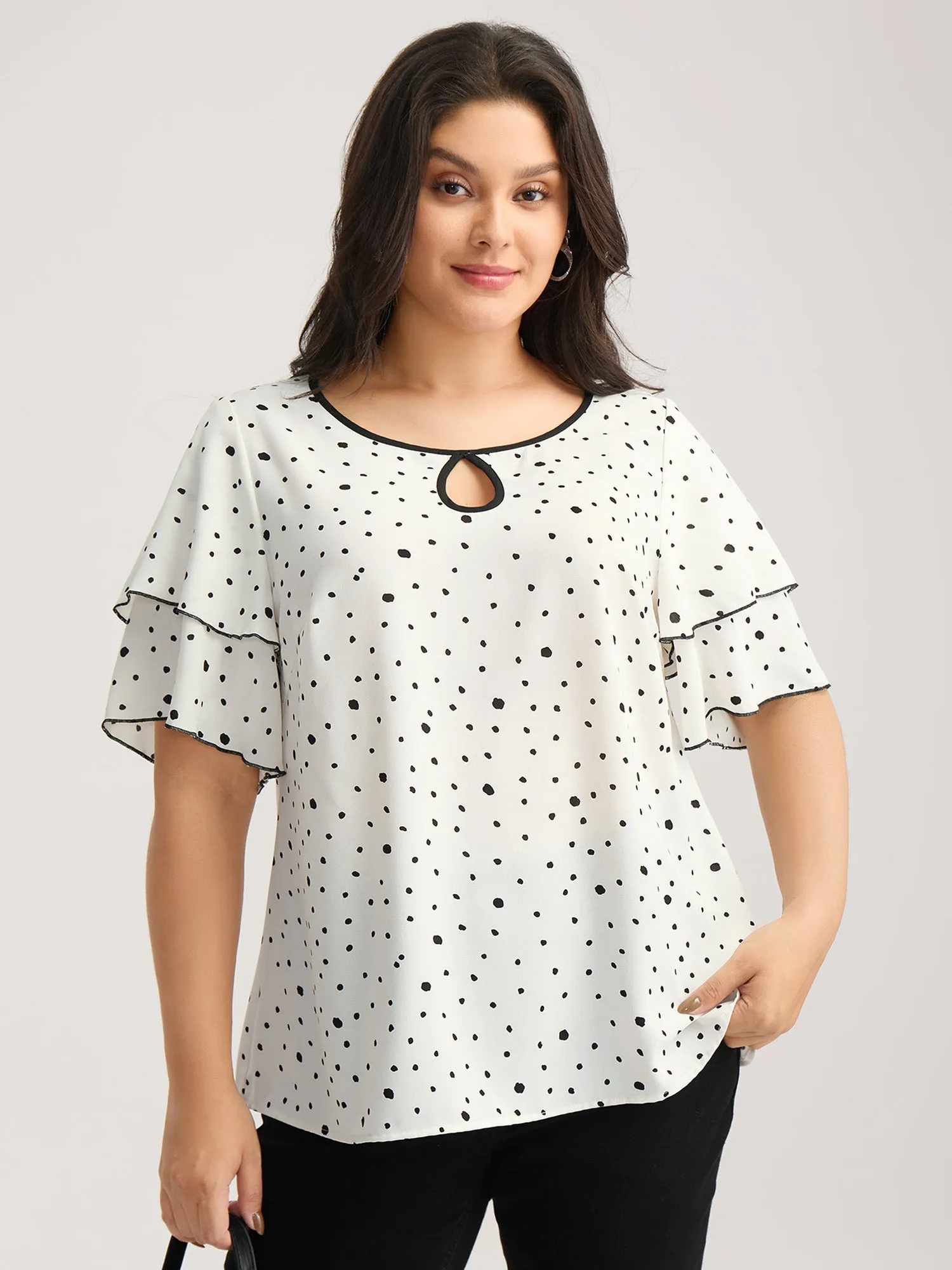 Polka Dots Contrast Layered Sleeve Blouse sold by Bloomchic