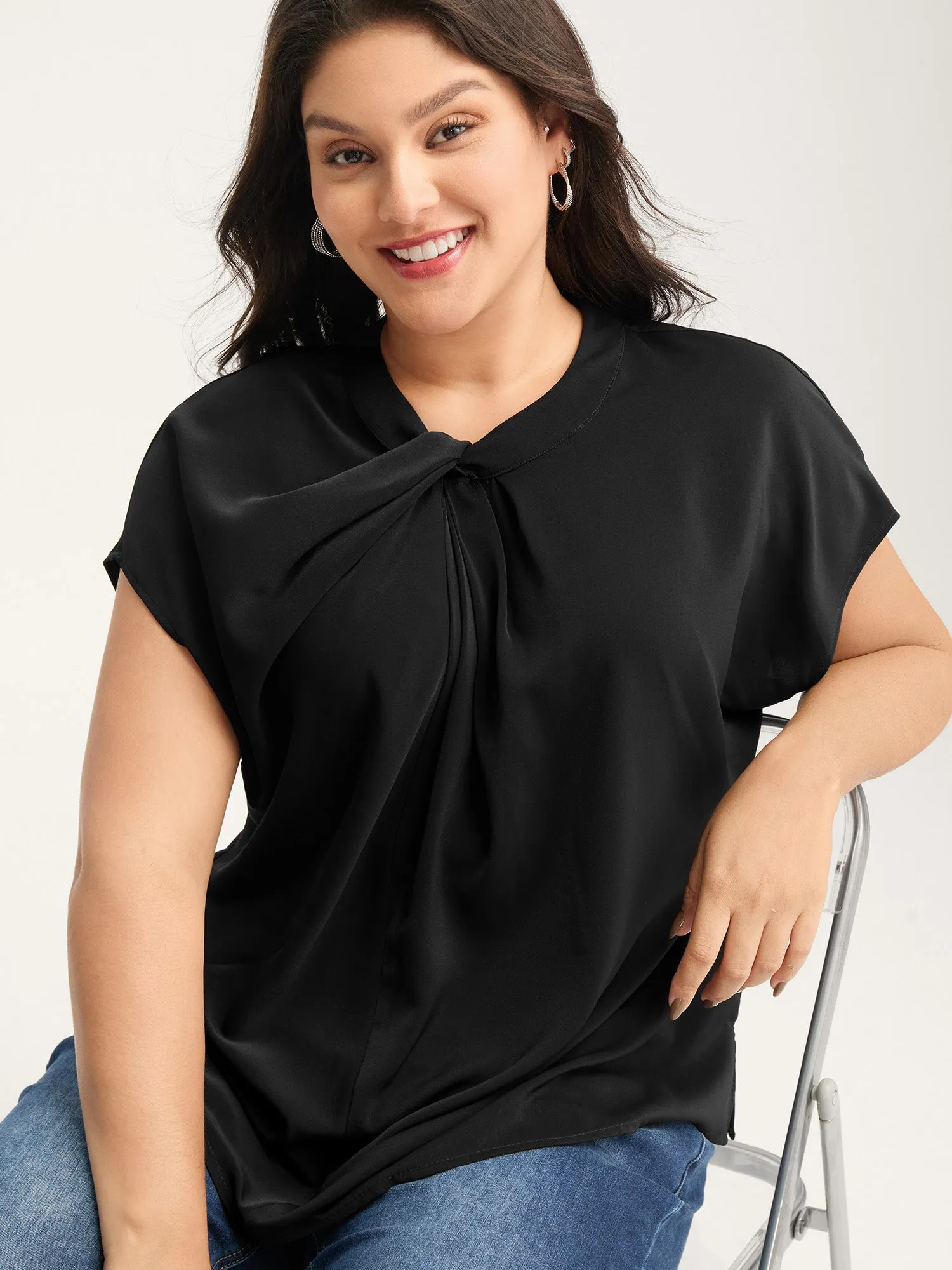 Solid Twist Neck Slit Blouse sold by Bloomchic