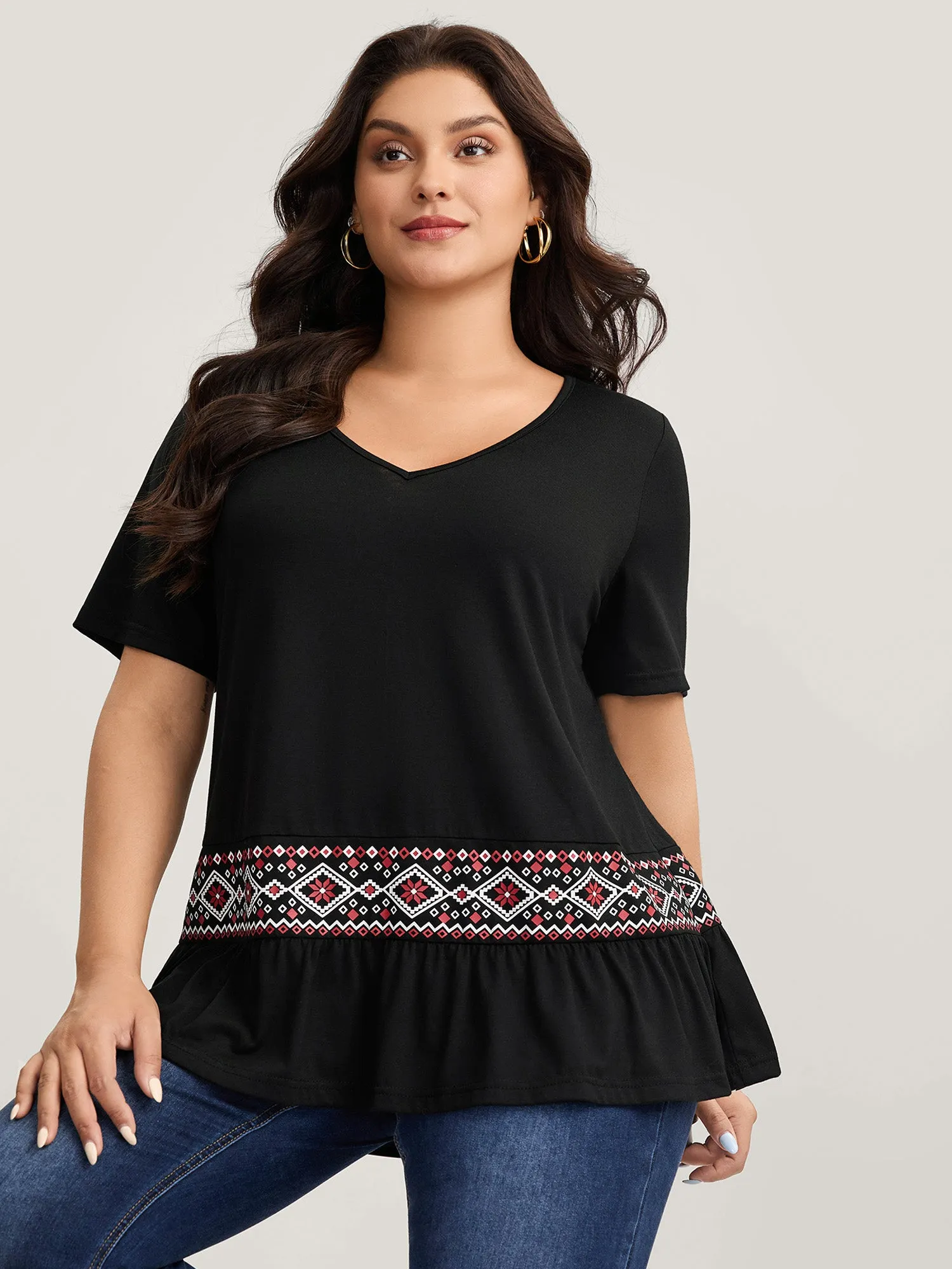 Stretchy Ruffled Hem Flowy Top sold by Bloomchic