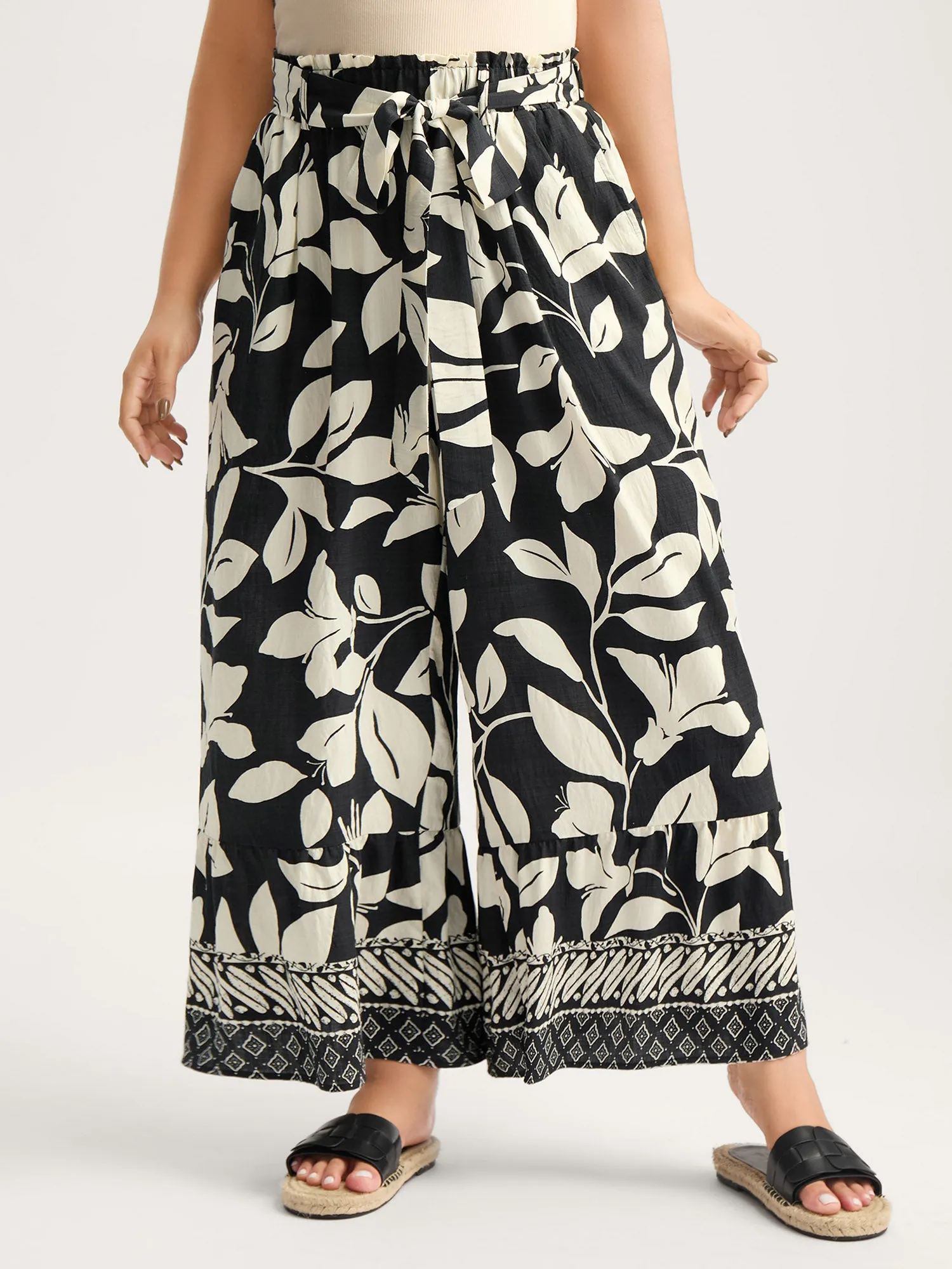 Leafy Ruffled Hem Belted Wide-Leg Pants sold by Bloomchic