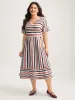Asymmetrical Stripes V-Neck Tiered Midi Dress sold by Bloomchic