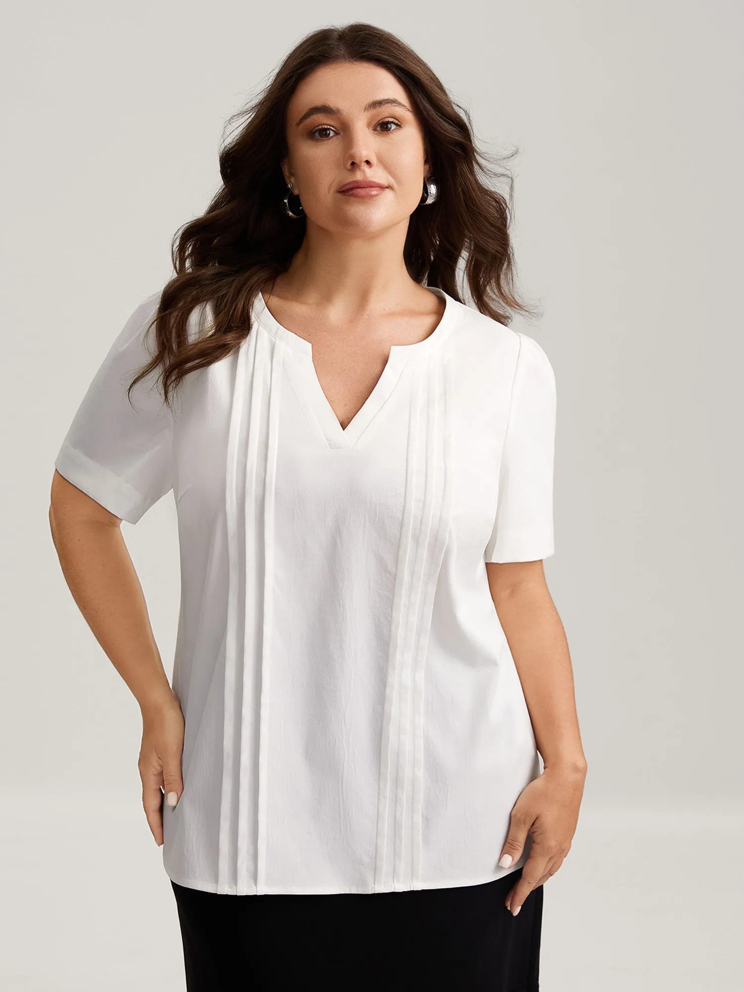 Toothpick Pleats Notched Collar Solid Blouse sold by Bloomchic