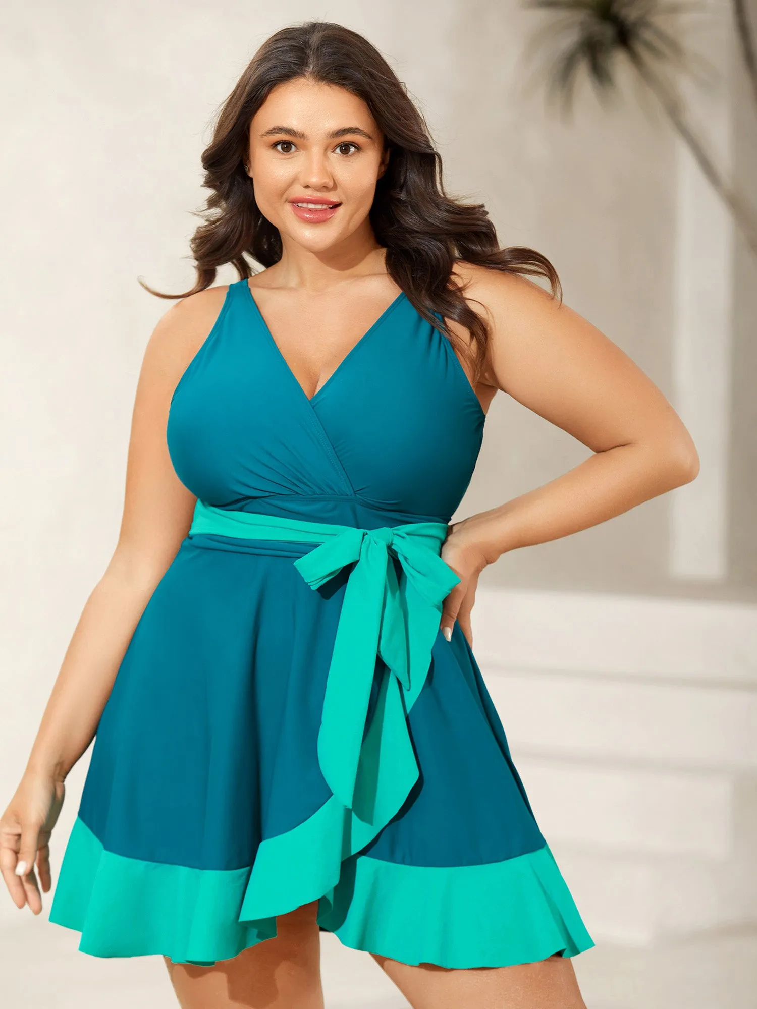 Color Block Ruffled Hem Swim Dress sold by Bloomchic