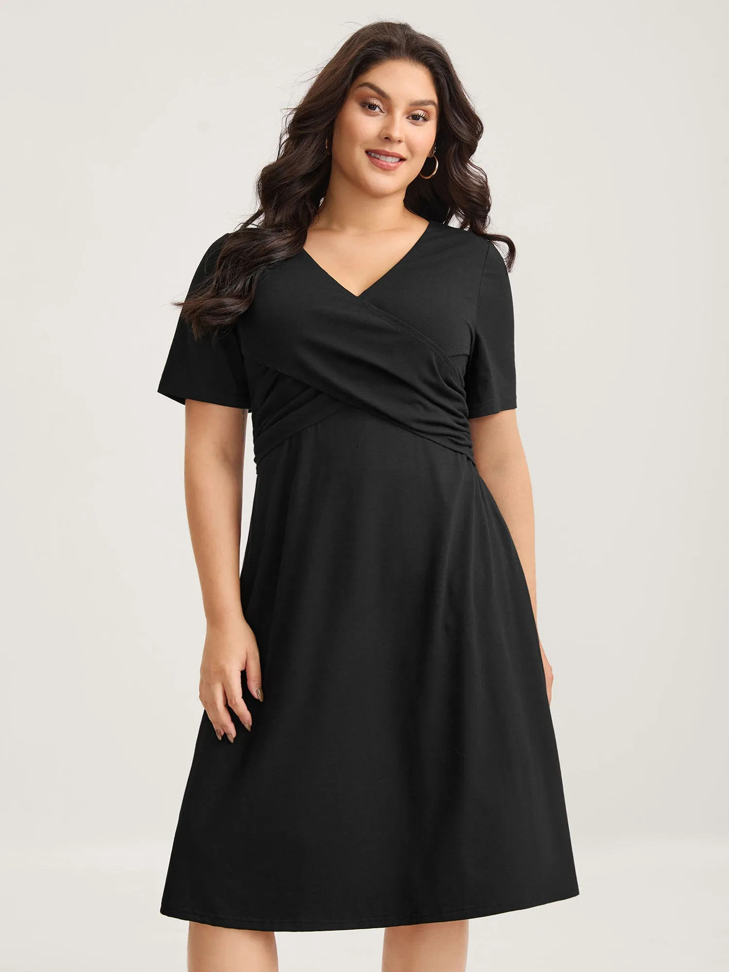 Overlap Bodice Solid Knit Pockets Midi Dress sold by Bloomchic