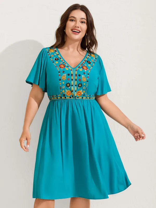 Rayon Floral Embroidered Pockets Midi Dress sold by Bloomchic
