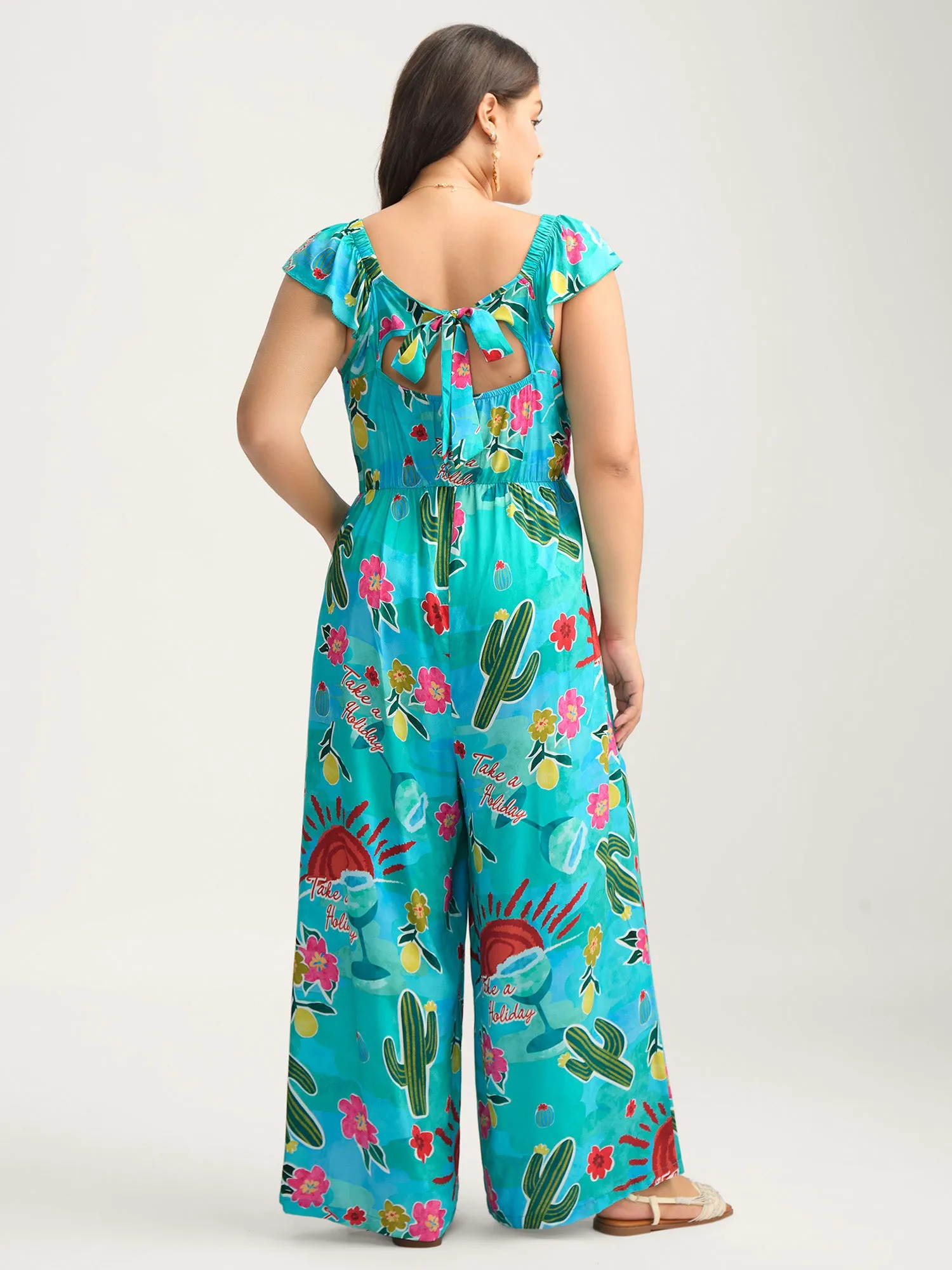 Cactus Holiday Print Cut-Out Back Jumpsuit sold by Bloomchic
