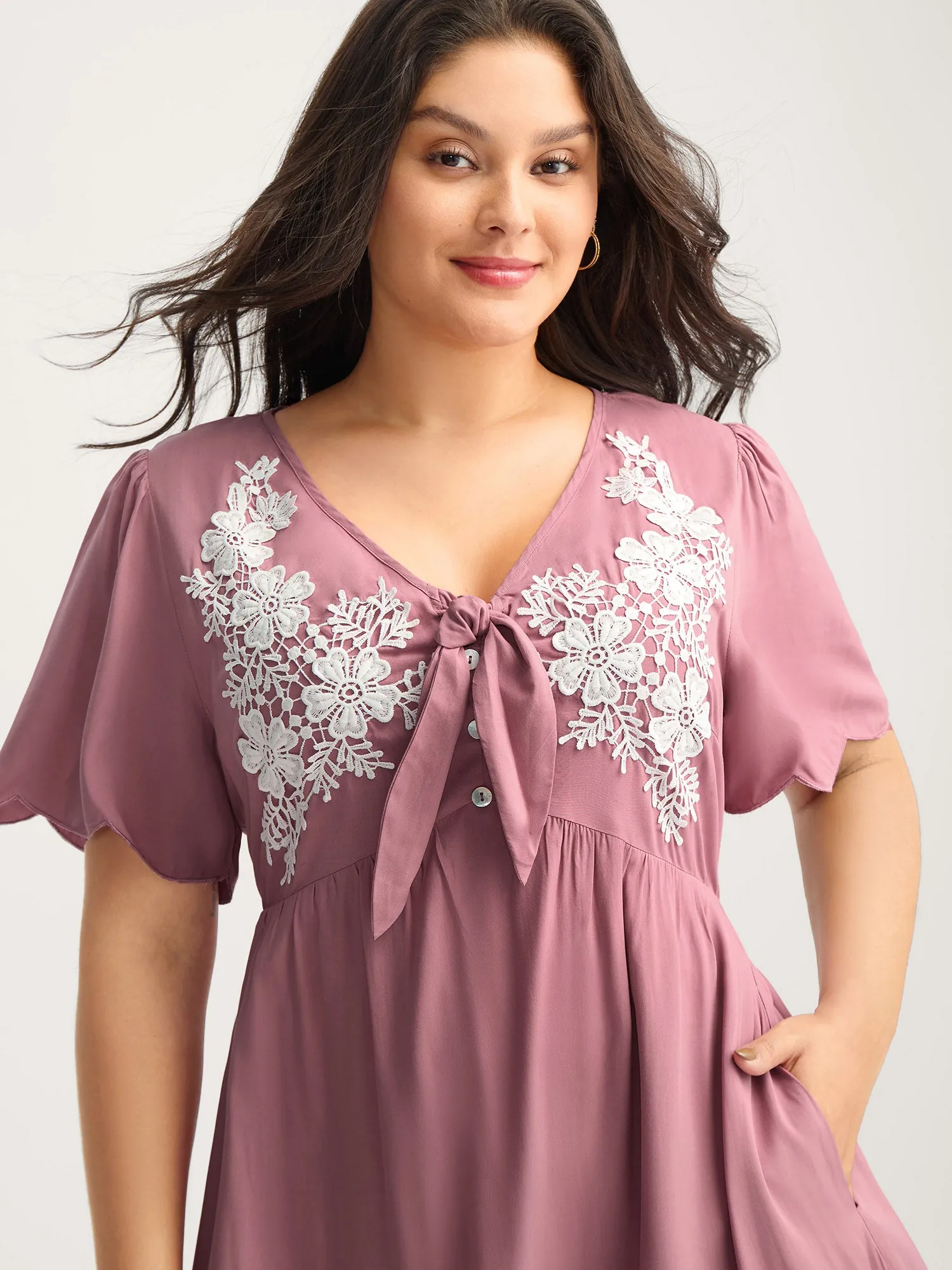 Rayon Bodice Embroidered Patchwork Knot Midi Dress sold by Bloomchic