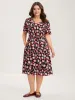 Floral Radiance Flared Scalloped Sleeve Midi Dress sold by Bloomchic