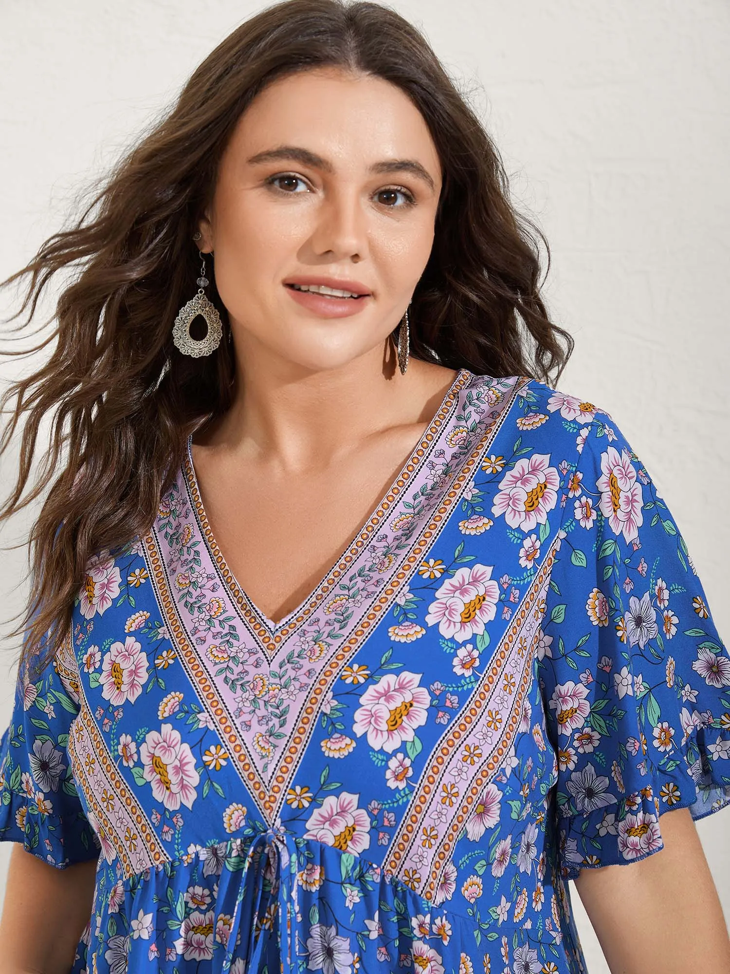 Asymmetrical Floral Print V-Neck Blouse sold by Bloomchic product image thumbnail 2