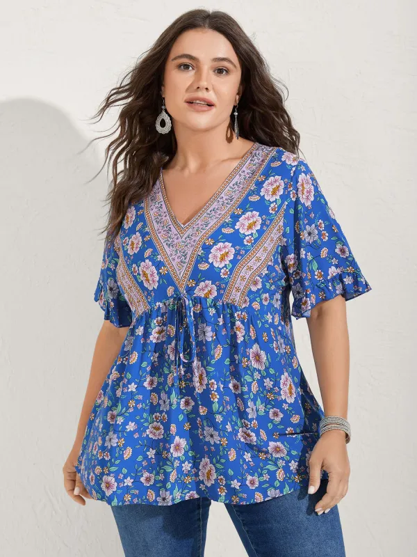 Asymmetrical Floral Print V-Neck Blouse sold by Bloomchic