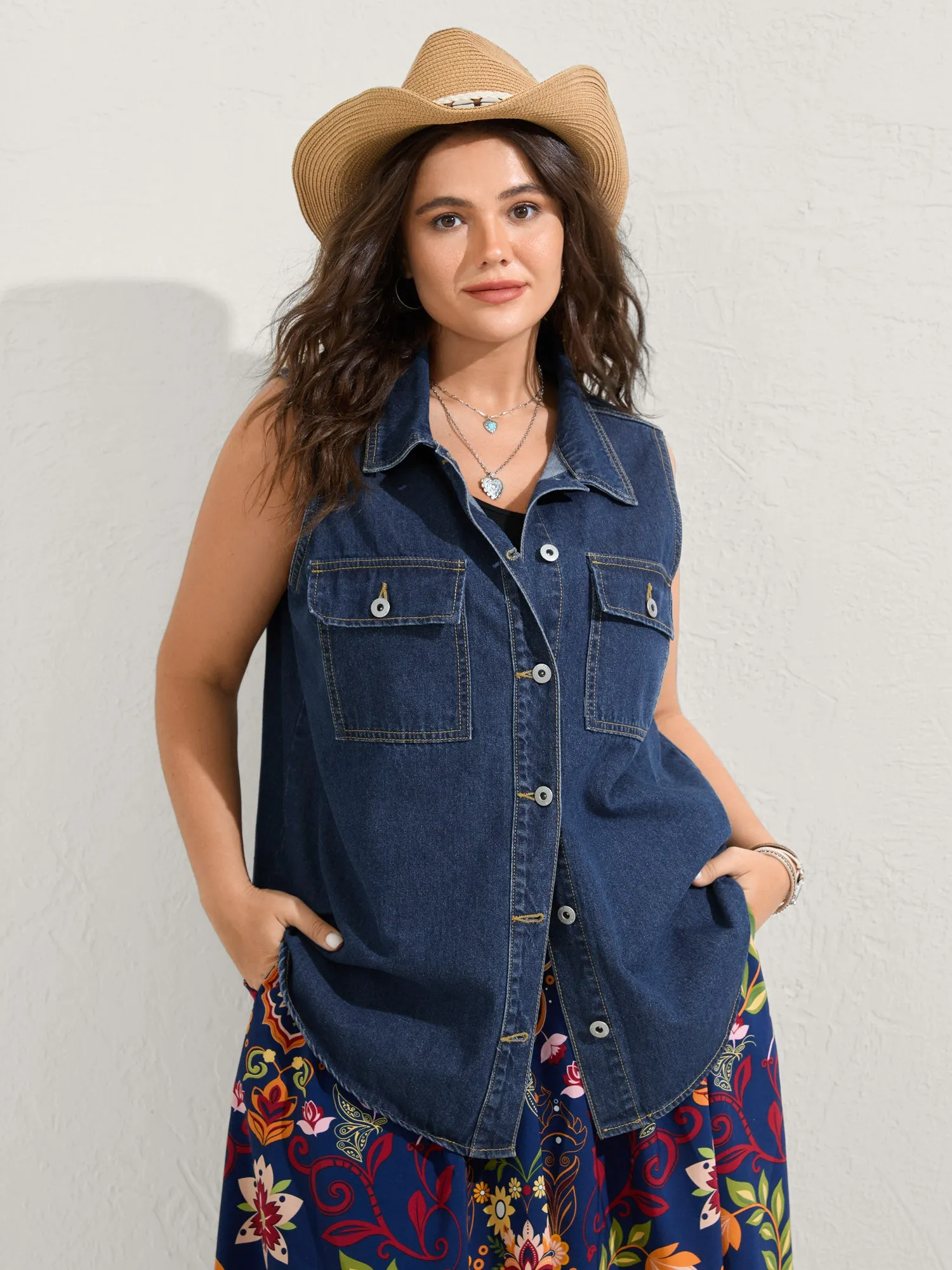 Button-Front Long Denim Vest Jacket sold by Bloomchic