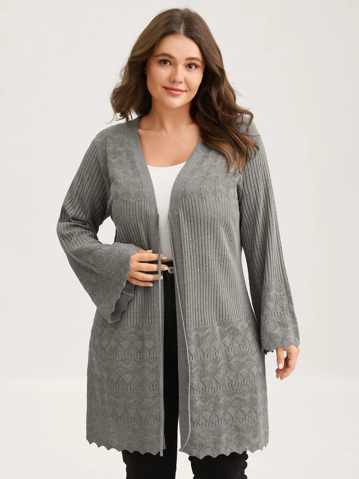 Front Tie Textured Long Knit Cardigan sold by Bloomchic