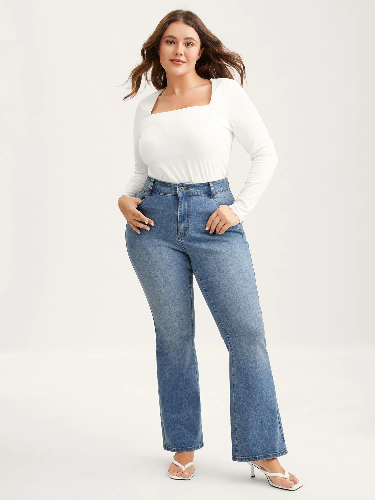 Butt-Lift Bootcut Mid Rise Jeans sold by Bloomchic