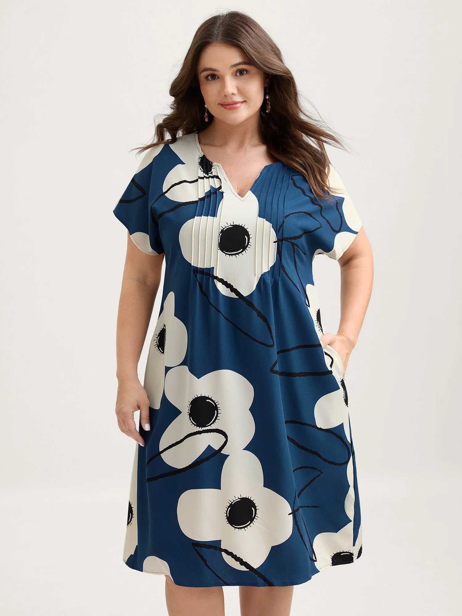 Floral Pleated Front Pockets Midi Dress sold by Bloomchic