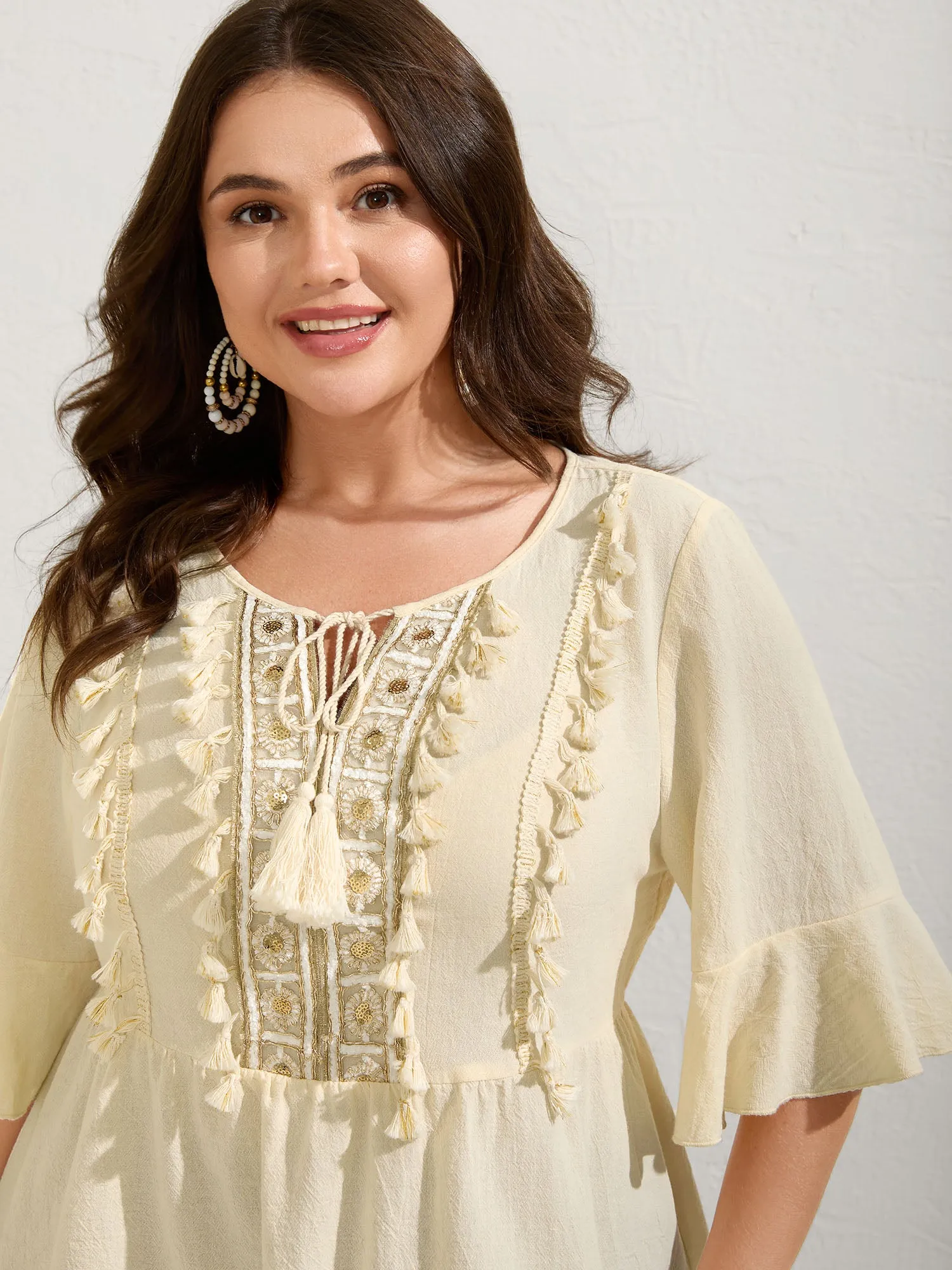 Cotton Tassel Neckline Ruffled Sleeve Solid Top sold by Bloomchic product image thumbnail 2