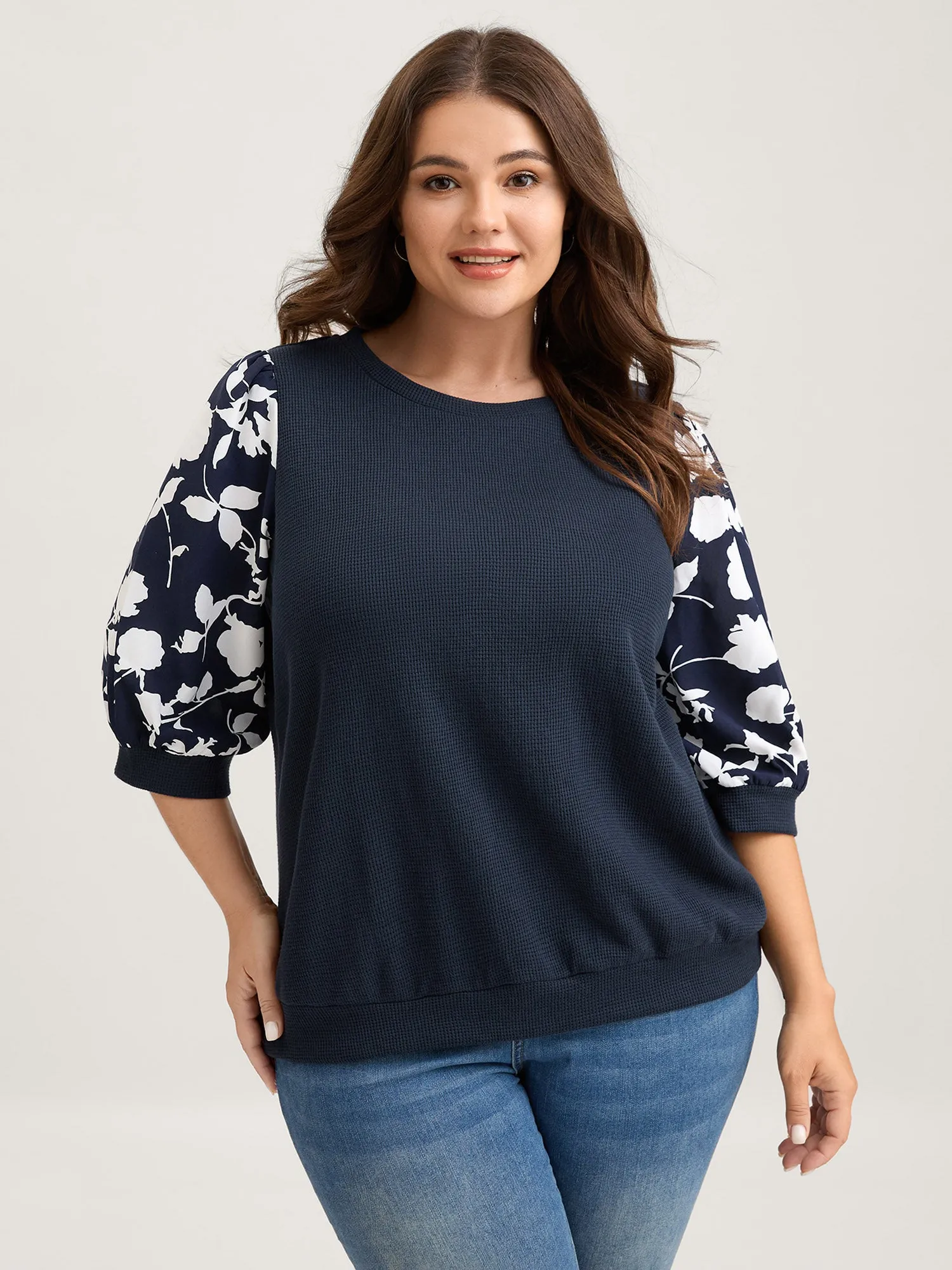 Textured Floral Puffy Sleeve Sweatshirt sold by Bloomchic