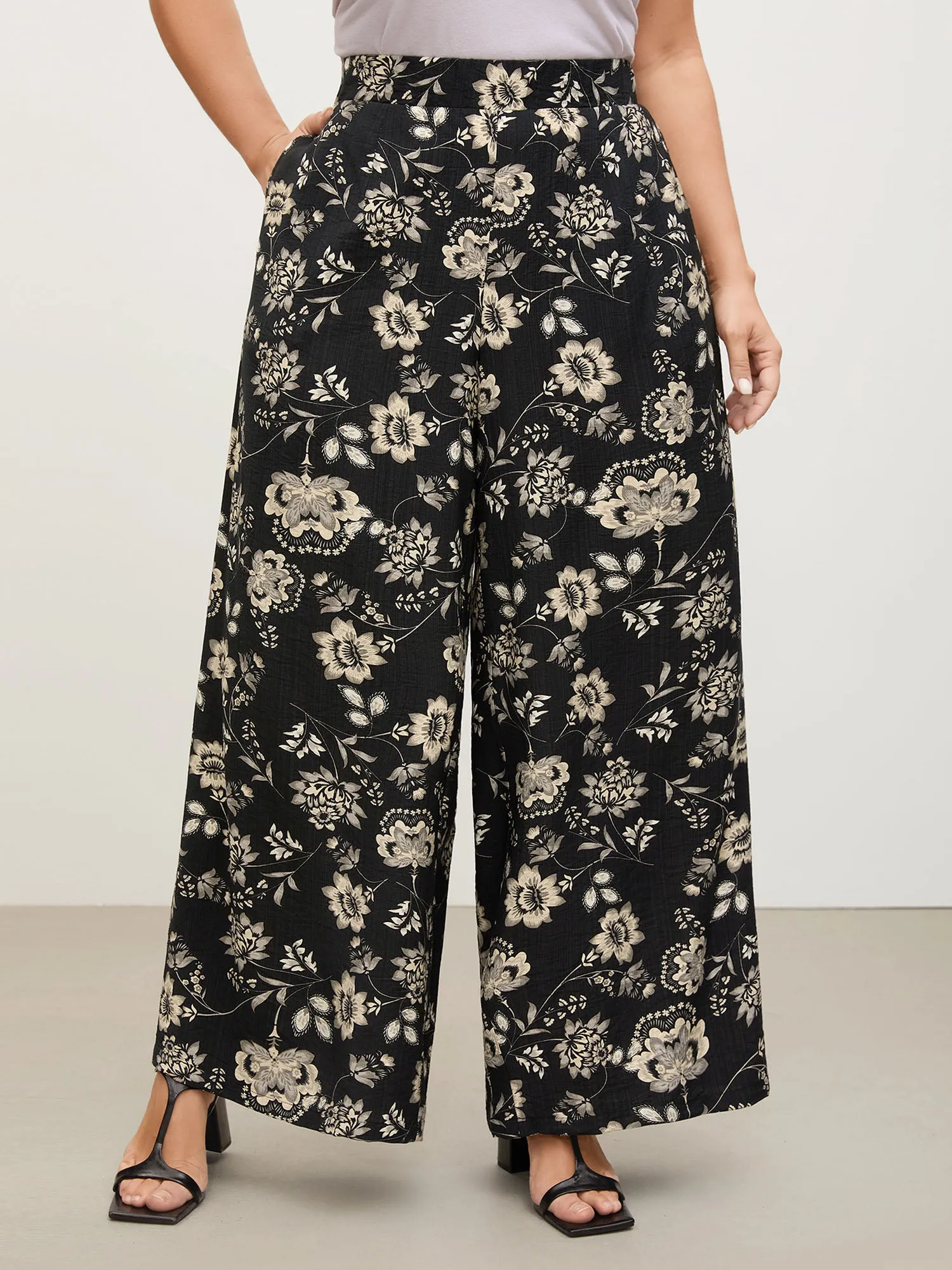 Silhouette Floral Print Wide-Leg Pants sold by Bloomchic