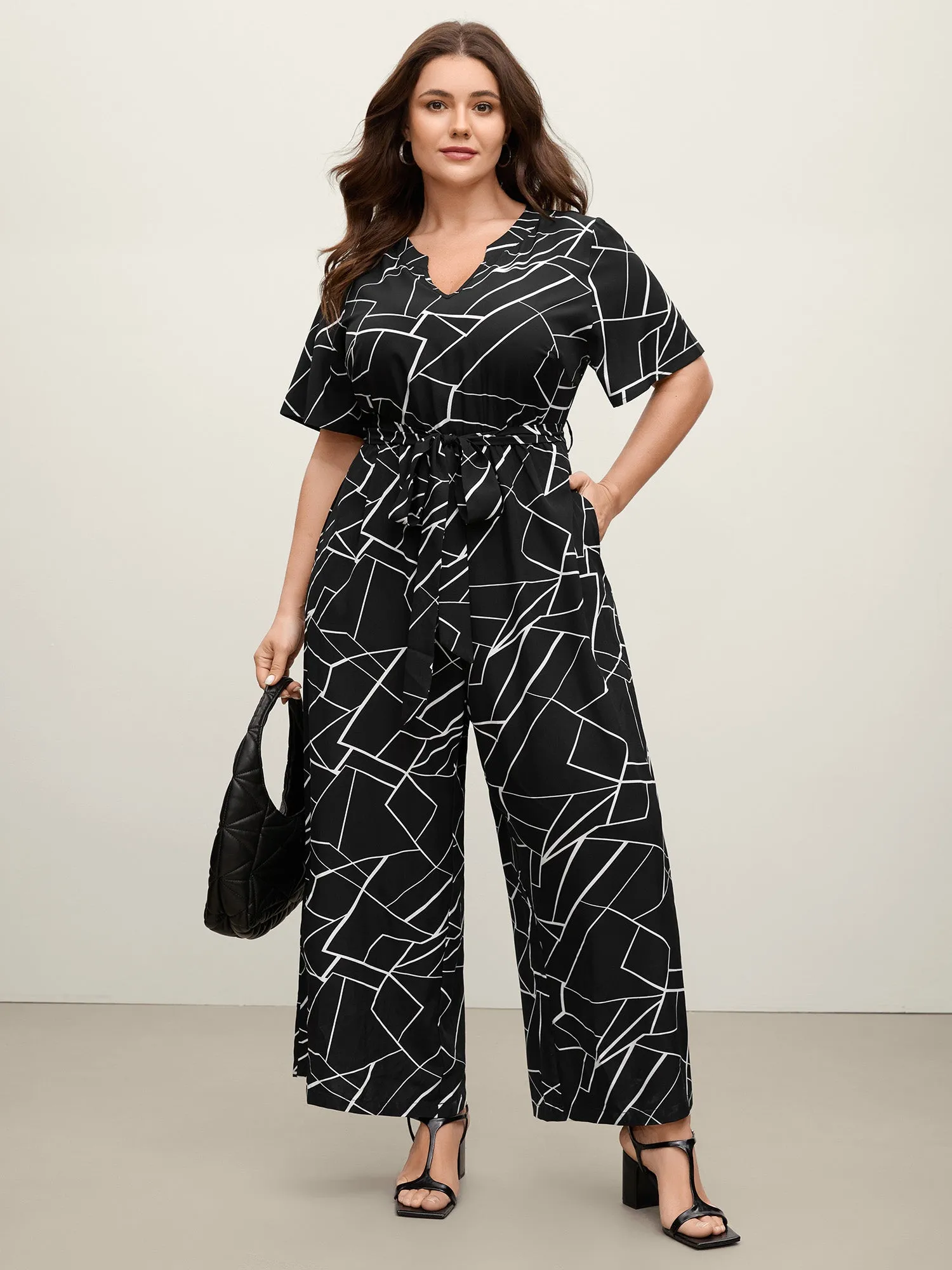Geometric Print Waist-Defining Belted Jumpsuit sold by Bloomchic