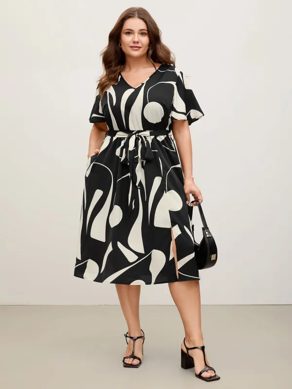 Floral Print Belted V-Neck Midi Dress sold by Bloomchic