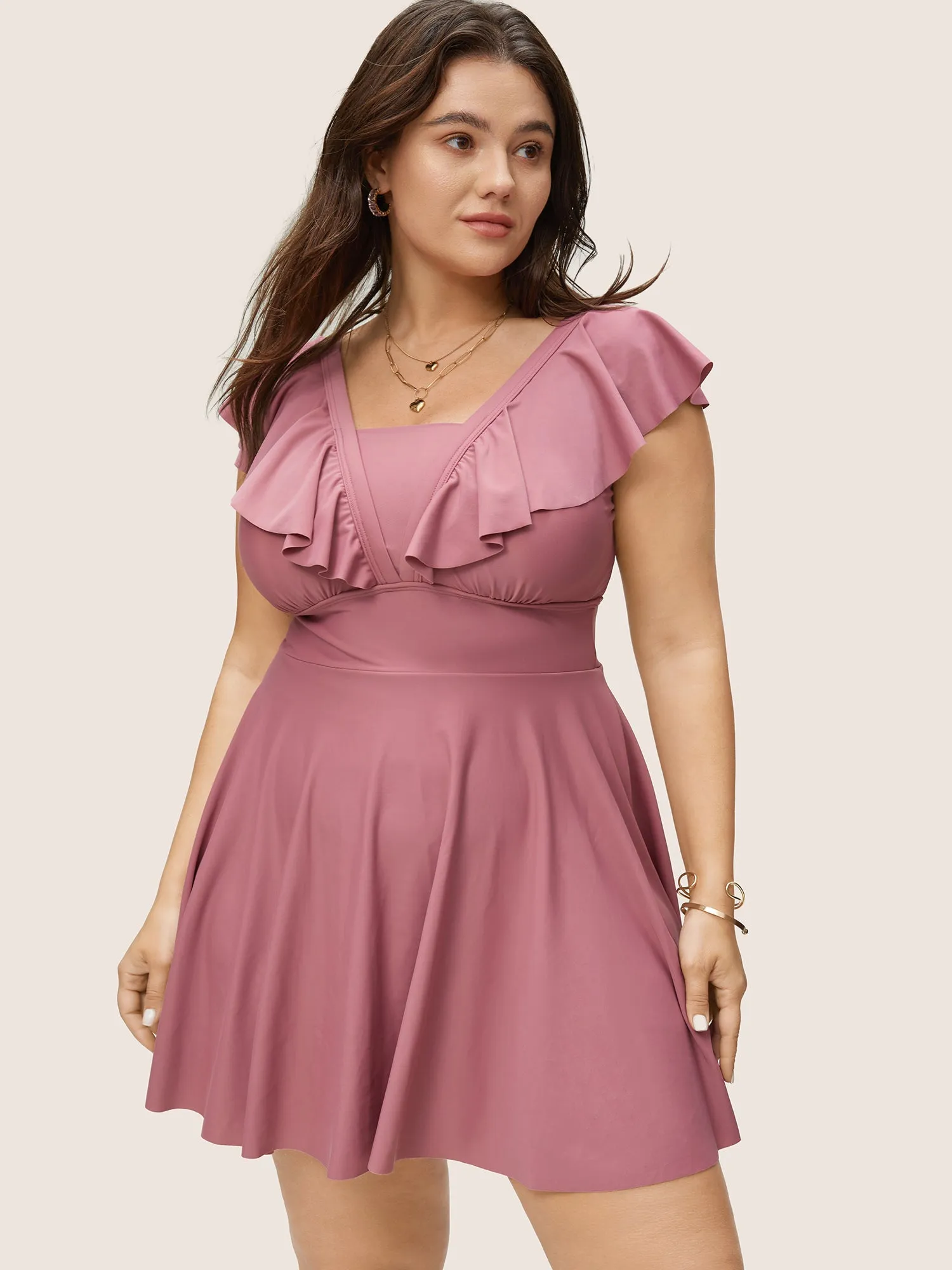 Solid Flutter Trim A Line Swim Dress sold by Bloomchic