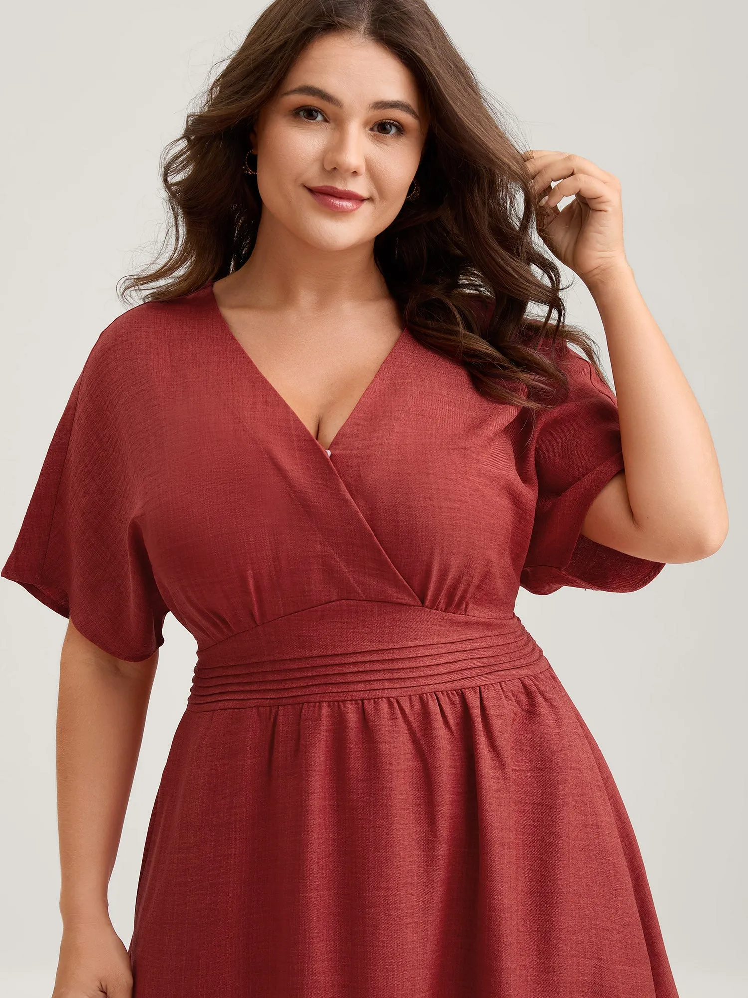 Waist-Cinched Tiered Surplice Midi Dress sold by Bloomchic product image thumbnail 2