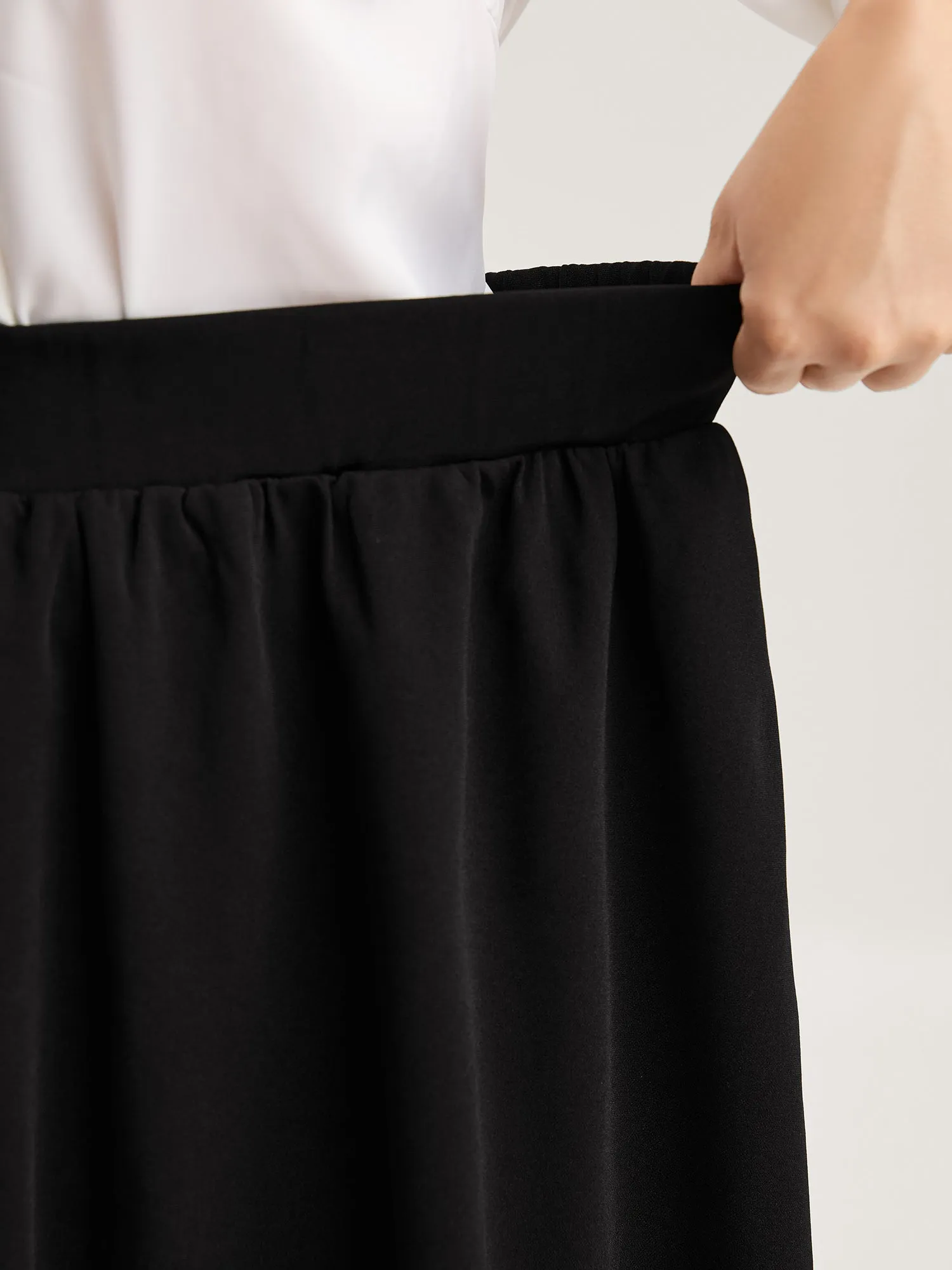 A-Line Solid Pleated Midi Skirt sold by Bloomchic product image thumbnail 3