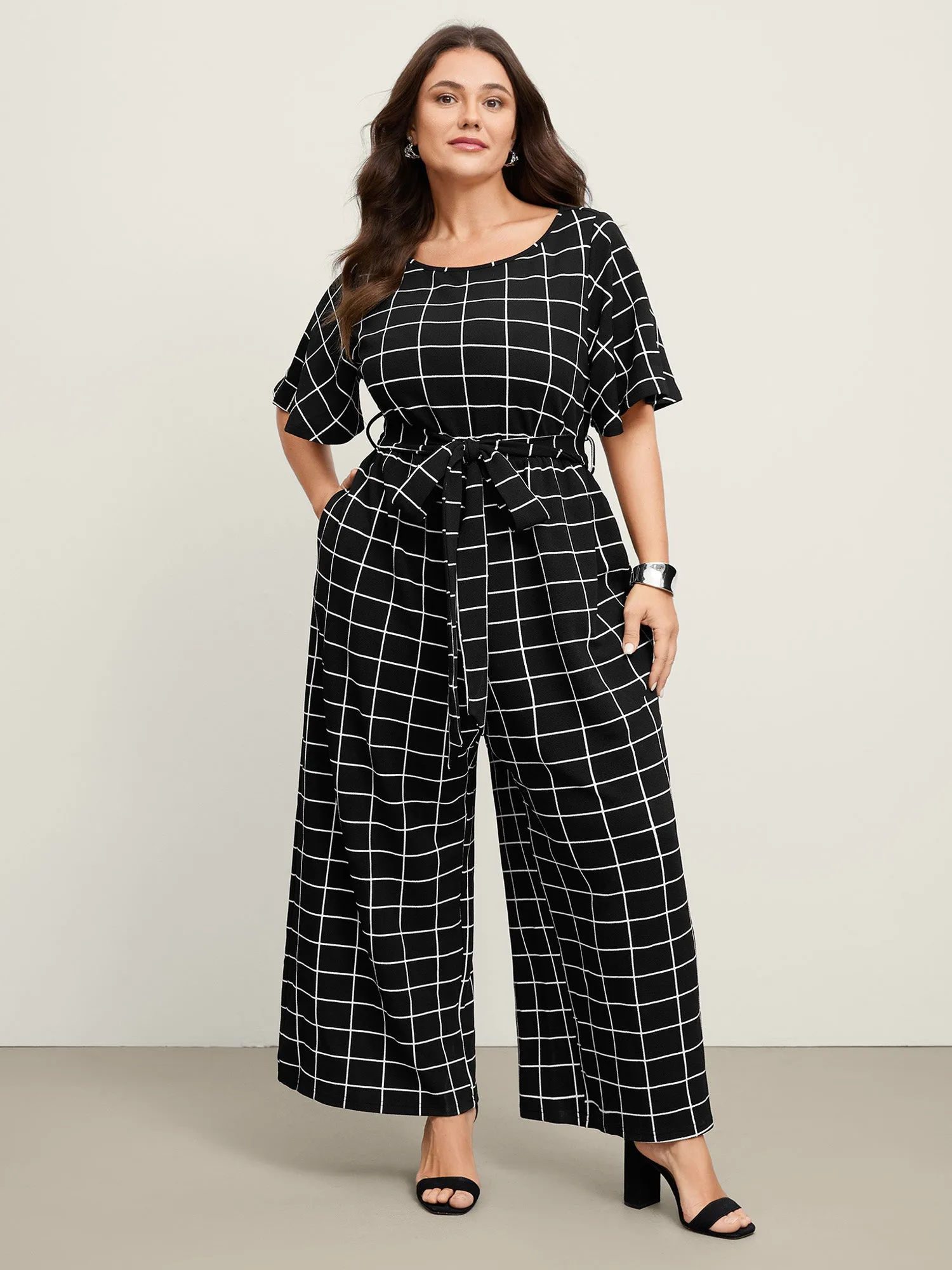 Grid Print Cinched Belted Waist Jumpsuit sold by Bloomchic