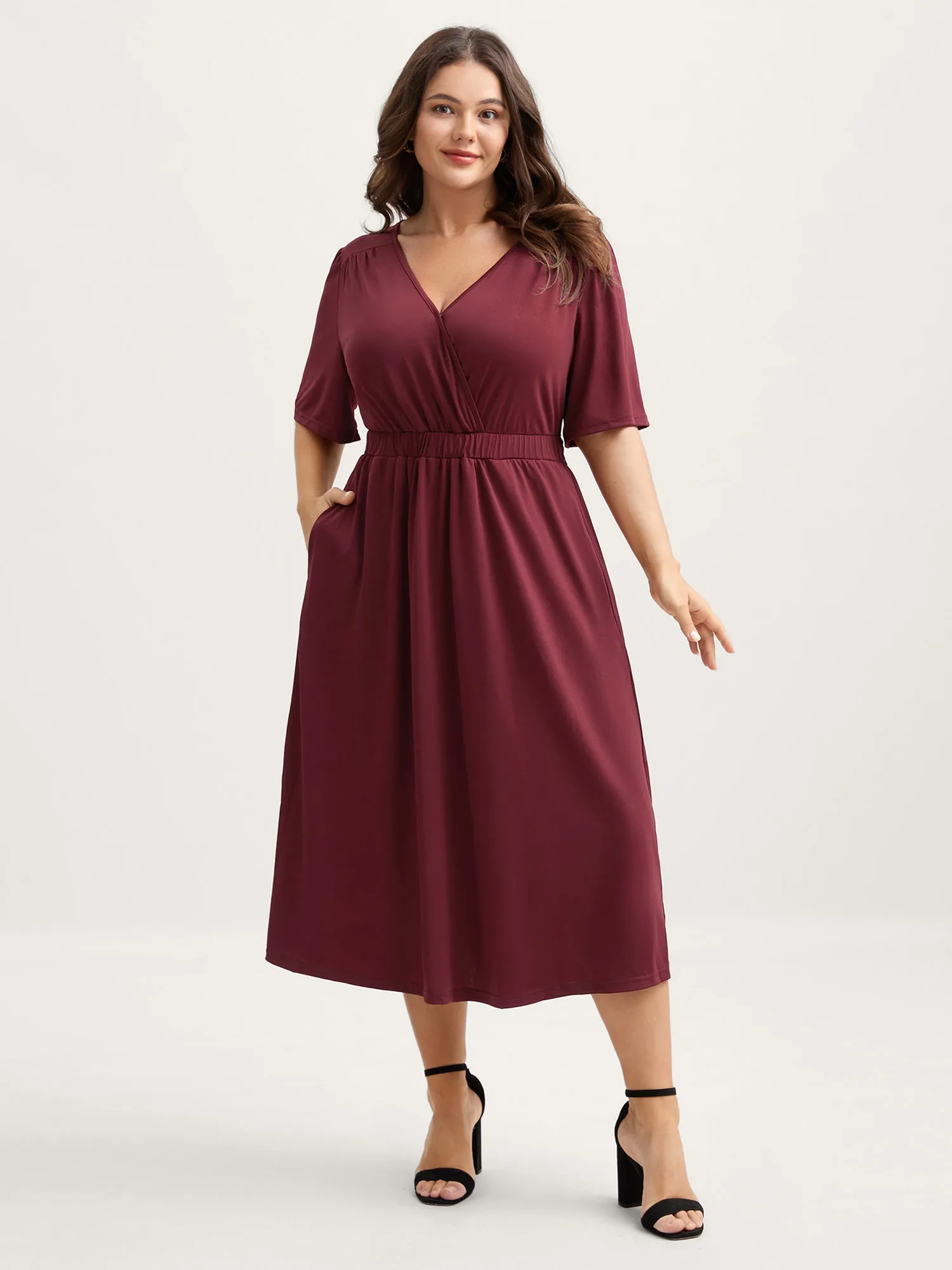 Stretchy Overlap Belted Pockets Midi Dress sold by Bloomchic