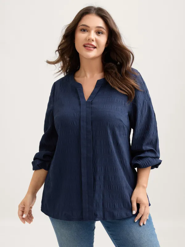 Notched Collar Textured Solid Blouse sold by Bloomchic