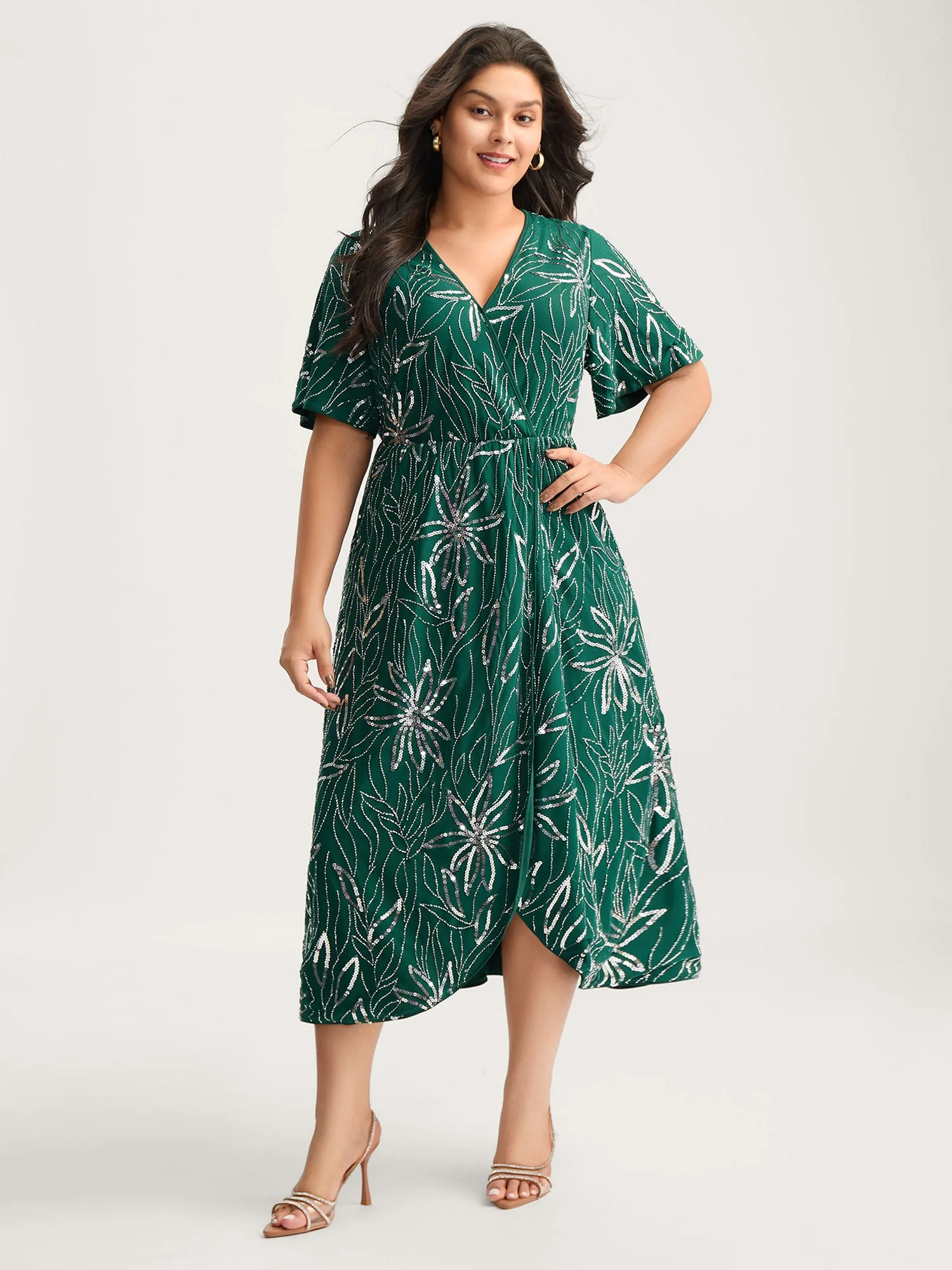 Sequin Embroidered Surplice Neck Pockets Midi Dress sold by Bloomchic