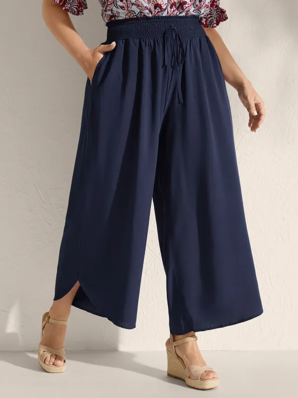 Shirred Waist Curvy Hem Wide-Leg Pants sold by Bloomchic