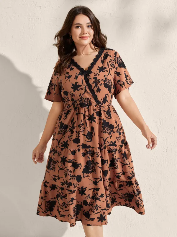 Silhouette Flower Print Contrast Surplice Midi Dress sold by Bloomchic