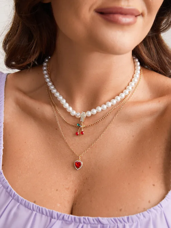 Pearl Decor Heart Charm Layered Necklace sold by Bloomchic