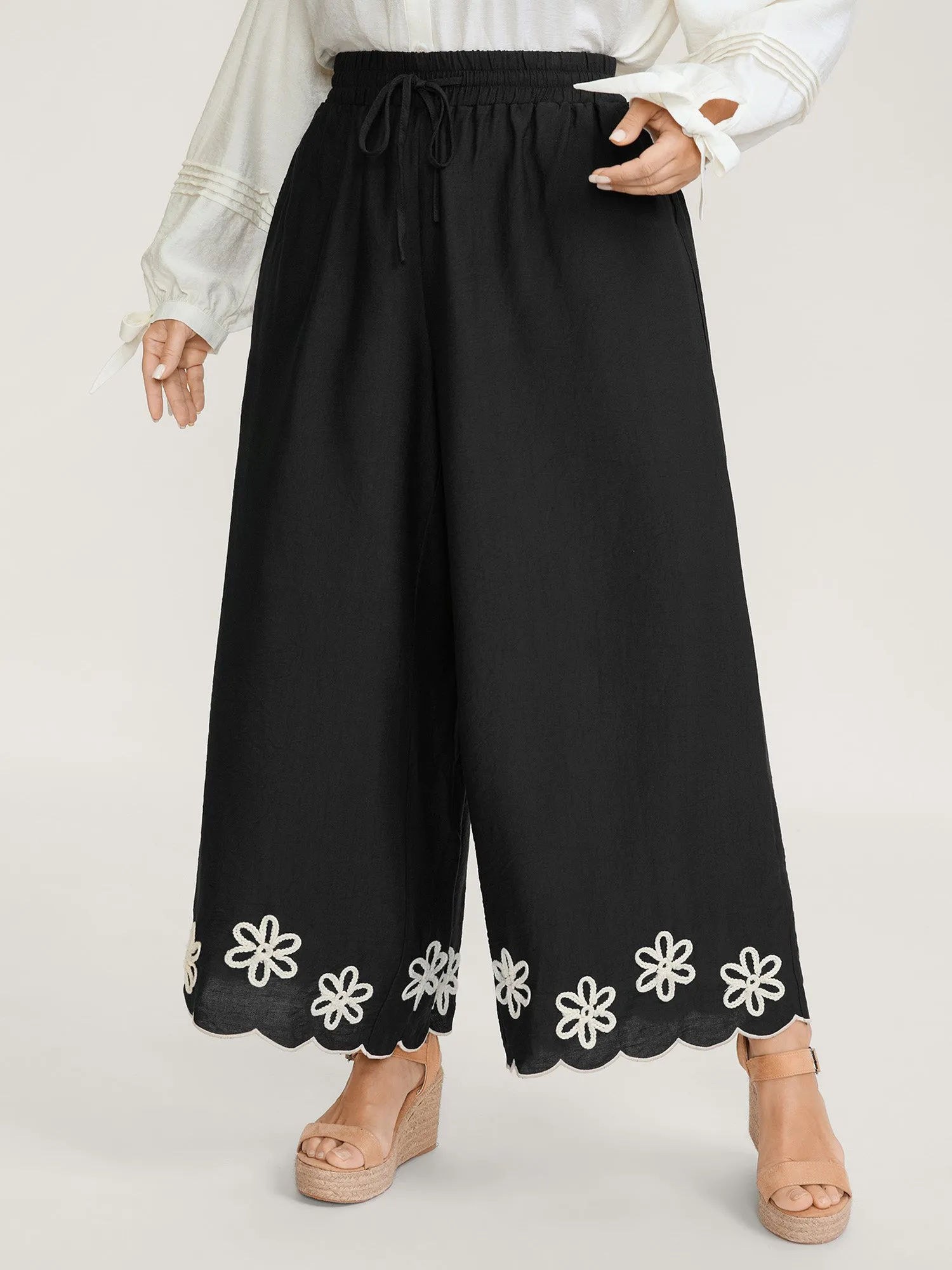 Floral Embroidered Hem Drawstring Pants sold by Bloomchic