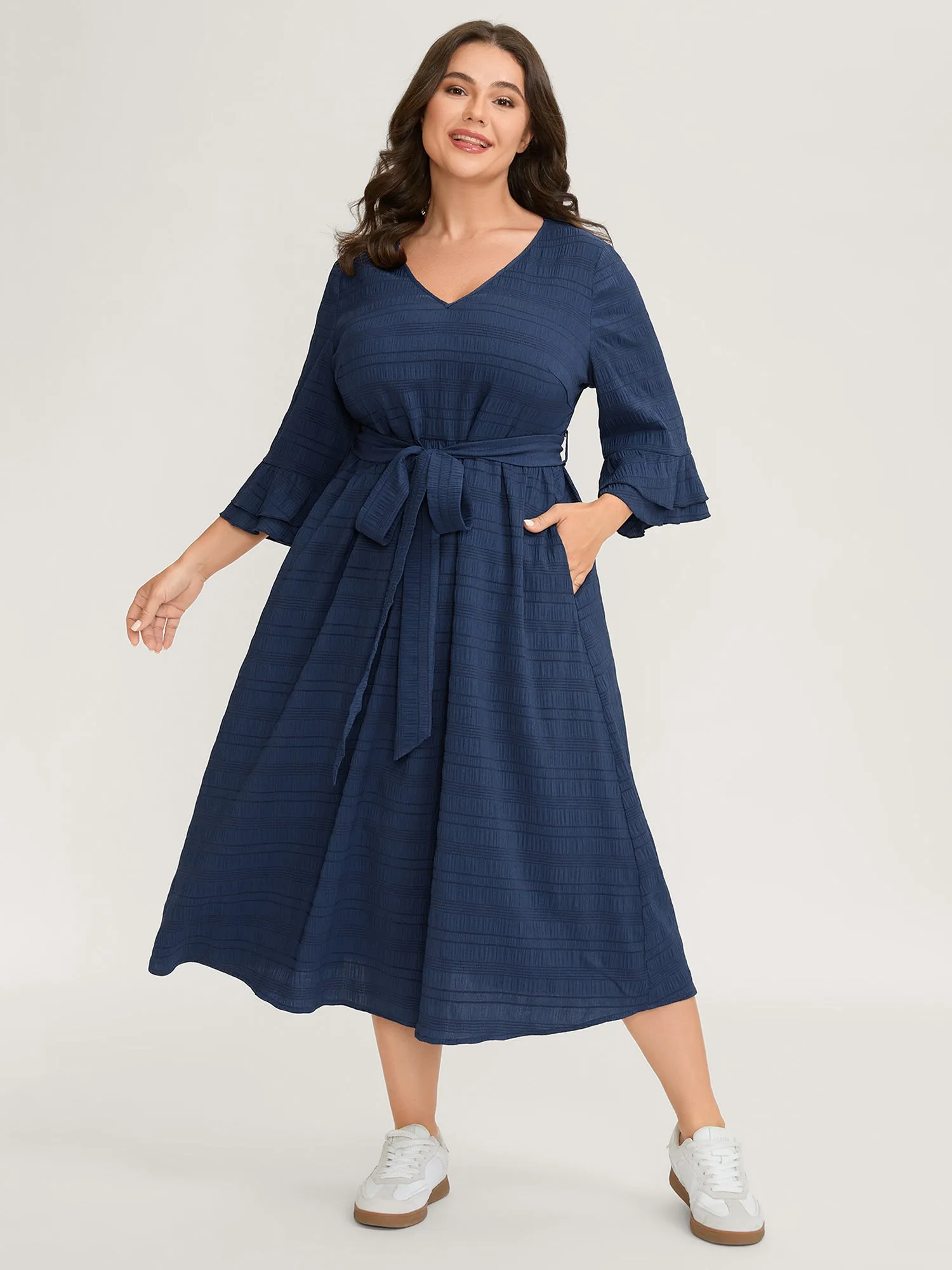 Textured Layered Ruffled Sleeve Belted Midi Dress sold by Bloomchic