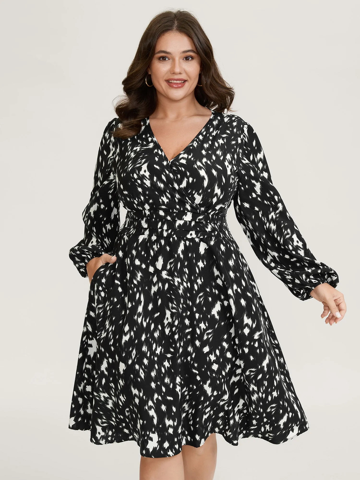 Leopard Print Pleated Waist Wrap Midi Dress sold by Bloomchic