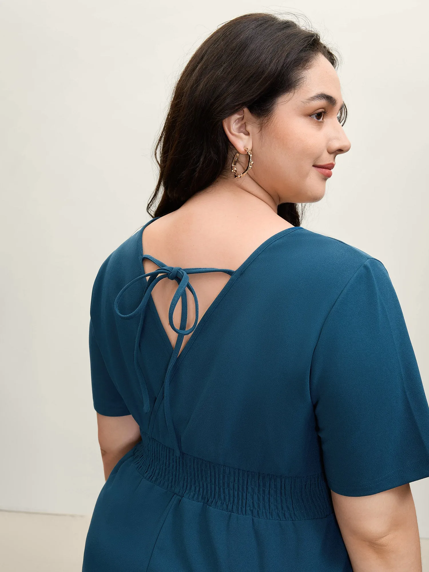 Shirred Waist Surplice Wide-Leg Jumpsuit sold by Bloomchic product image thumbnail 2