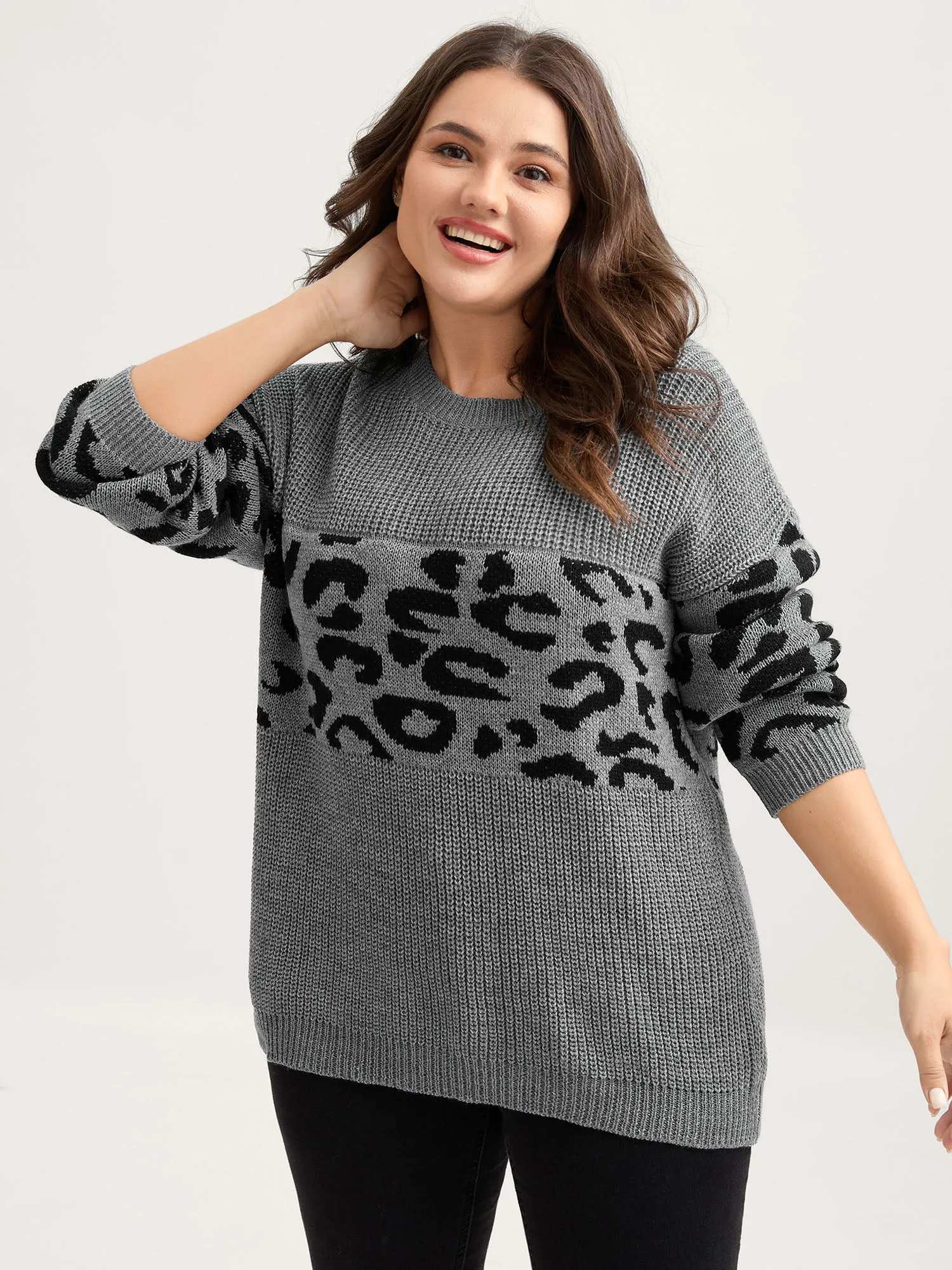 Leopard Print Round Neck Textured Pullover sold by Bloomchic