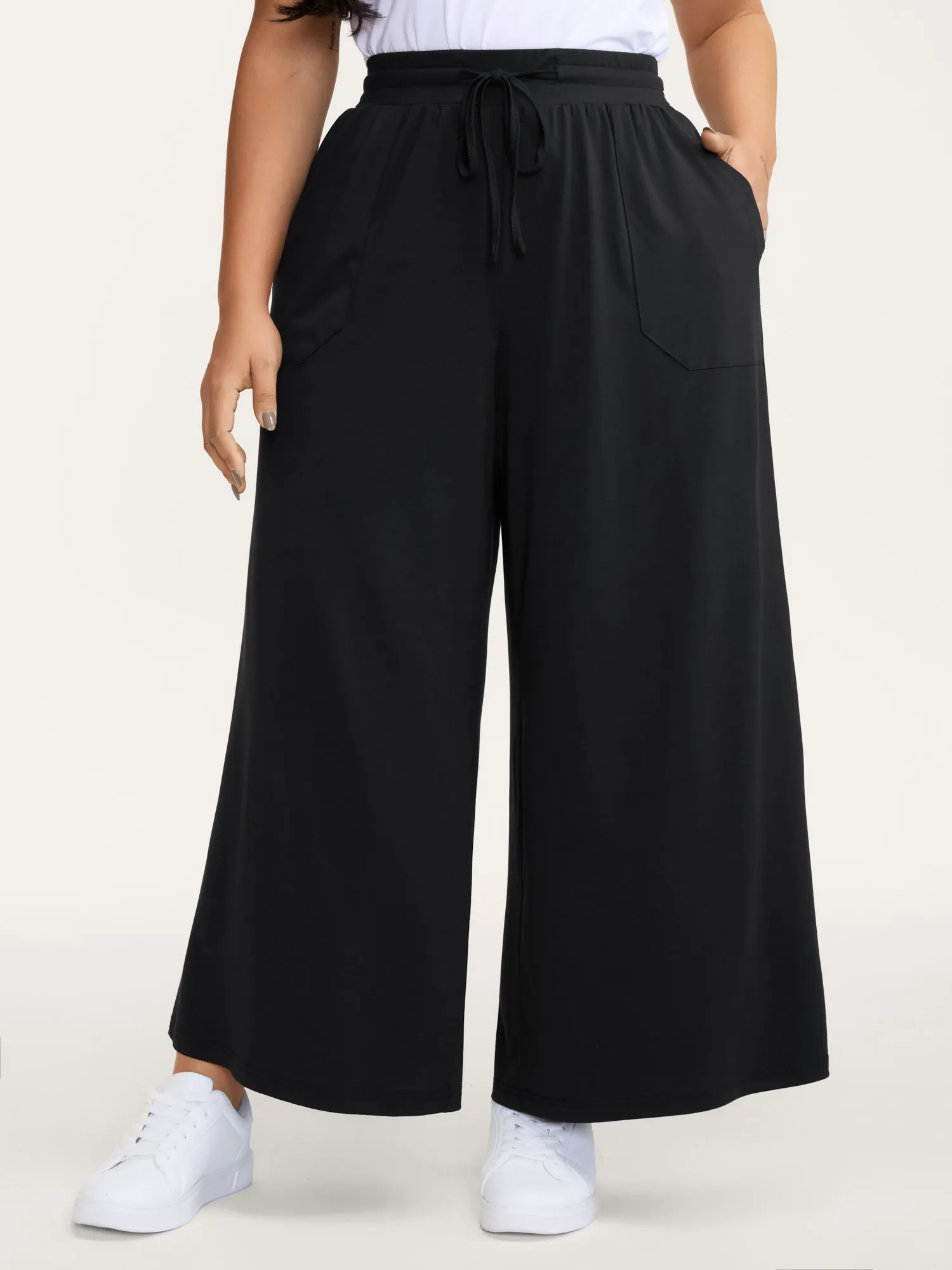 Wide Waistband Drawstring Flared Pants sold by Bloomchic