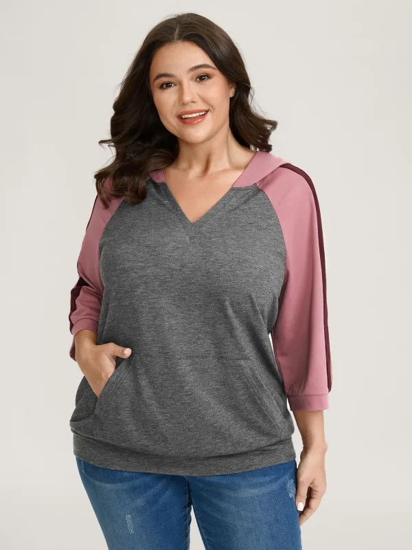 Color Contrast Spliced Stretchy Hem Hoodie sold by Bloomchic