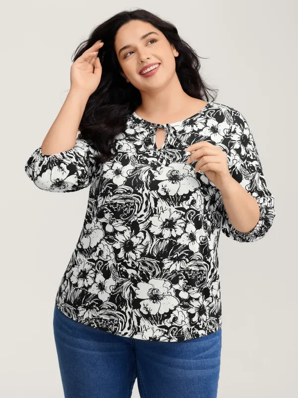 Stretchy Silhouette Flower Knit Top sold by Bloomchic